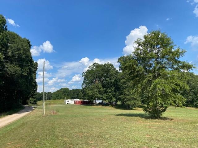 695 Crump Mill Road Martin, GA 30557 - Photo 5 of 26 a swimming pool with an outdoor space and seating area