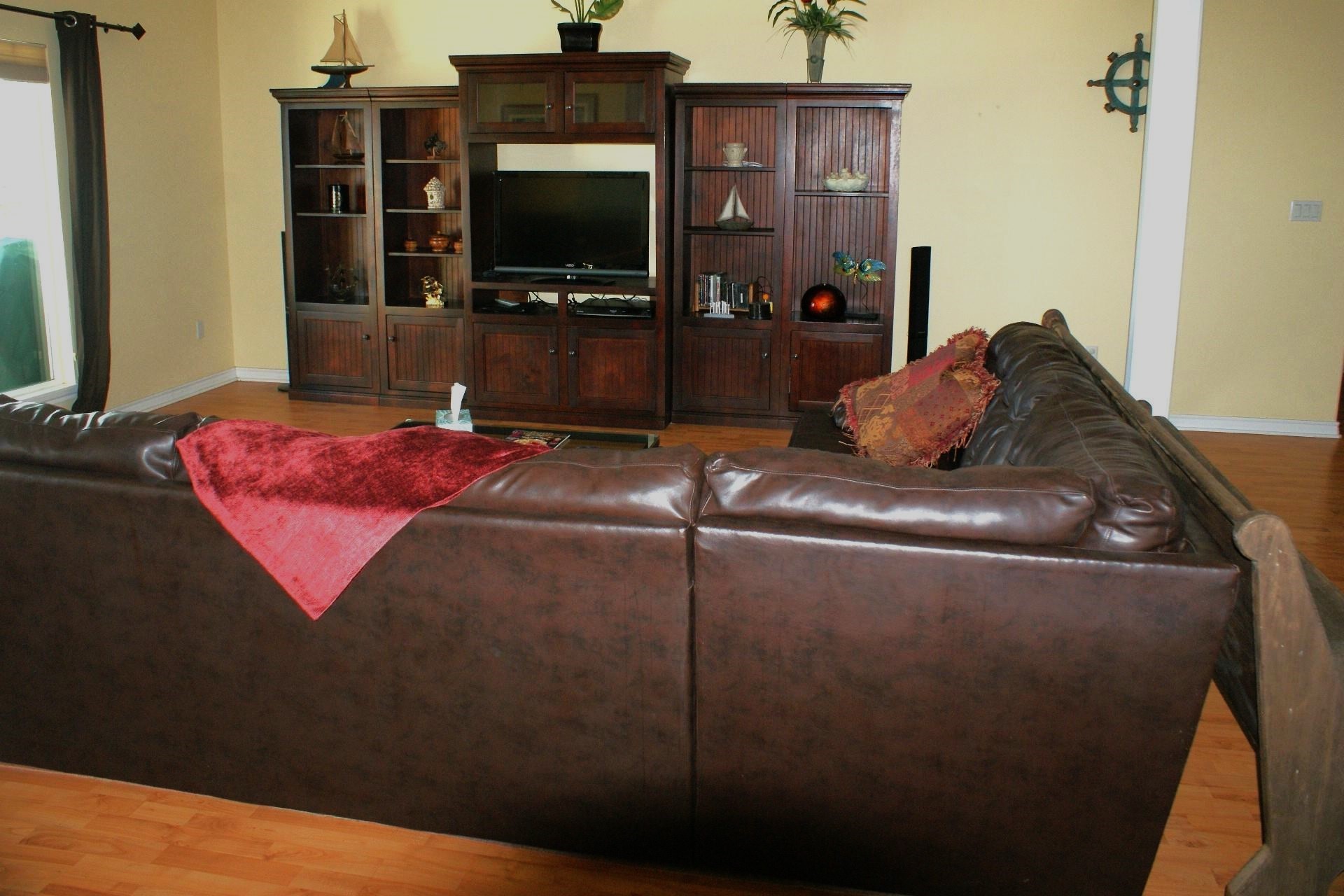 231 Memphis Belle Trinity, TX 75862 - Photo 24 of 47 a living room with furniture and a flat screen tv