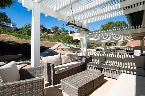 a view of a porch with furniture