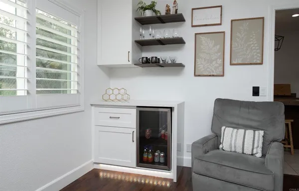 a living room with furniture and window