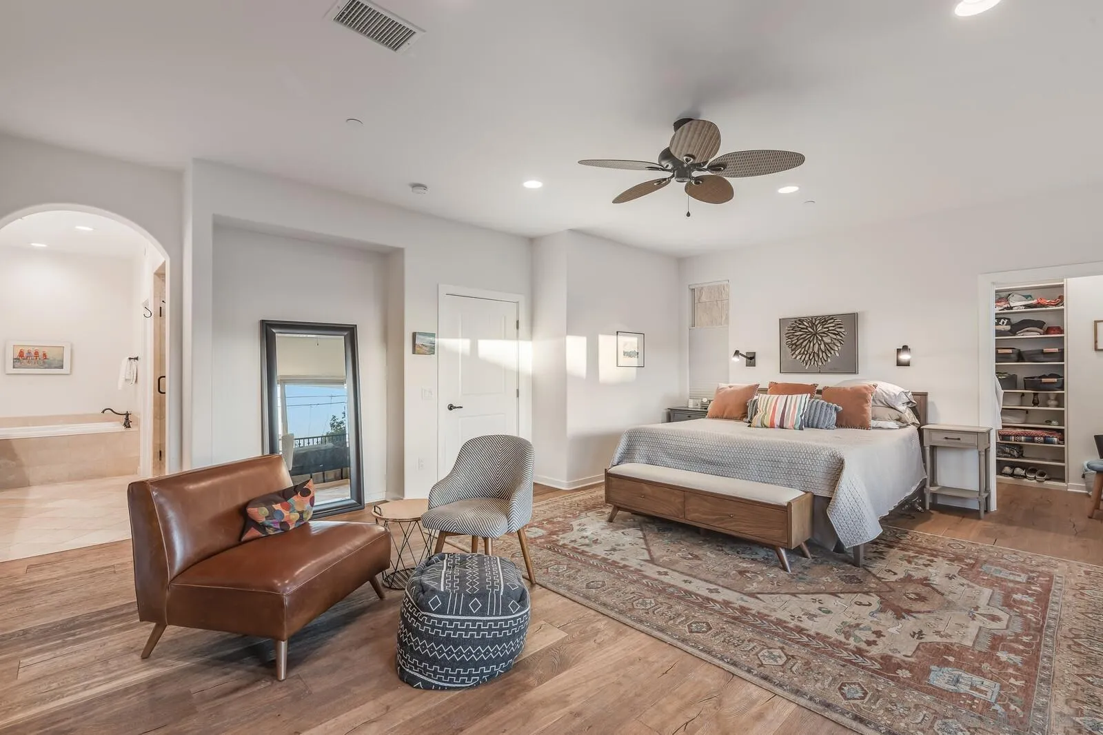 2009 MacKinnon Avenue Cardiff, CA 92007 - Photo 19 of 54 a living room with furniture a ceiling fan and a rug