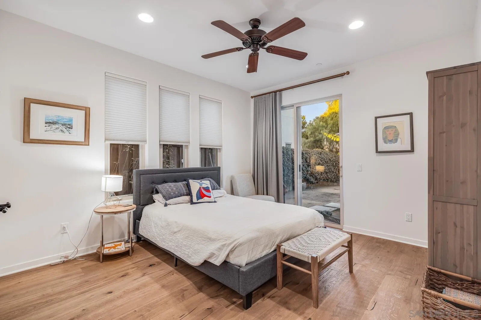 2009 MacKinnon Avenue Cardiff, CA 92007 - Photo 26 of 54 a bedroom with a bed and a chandelier