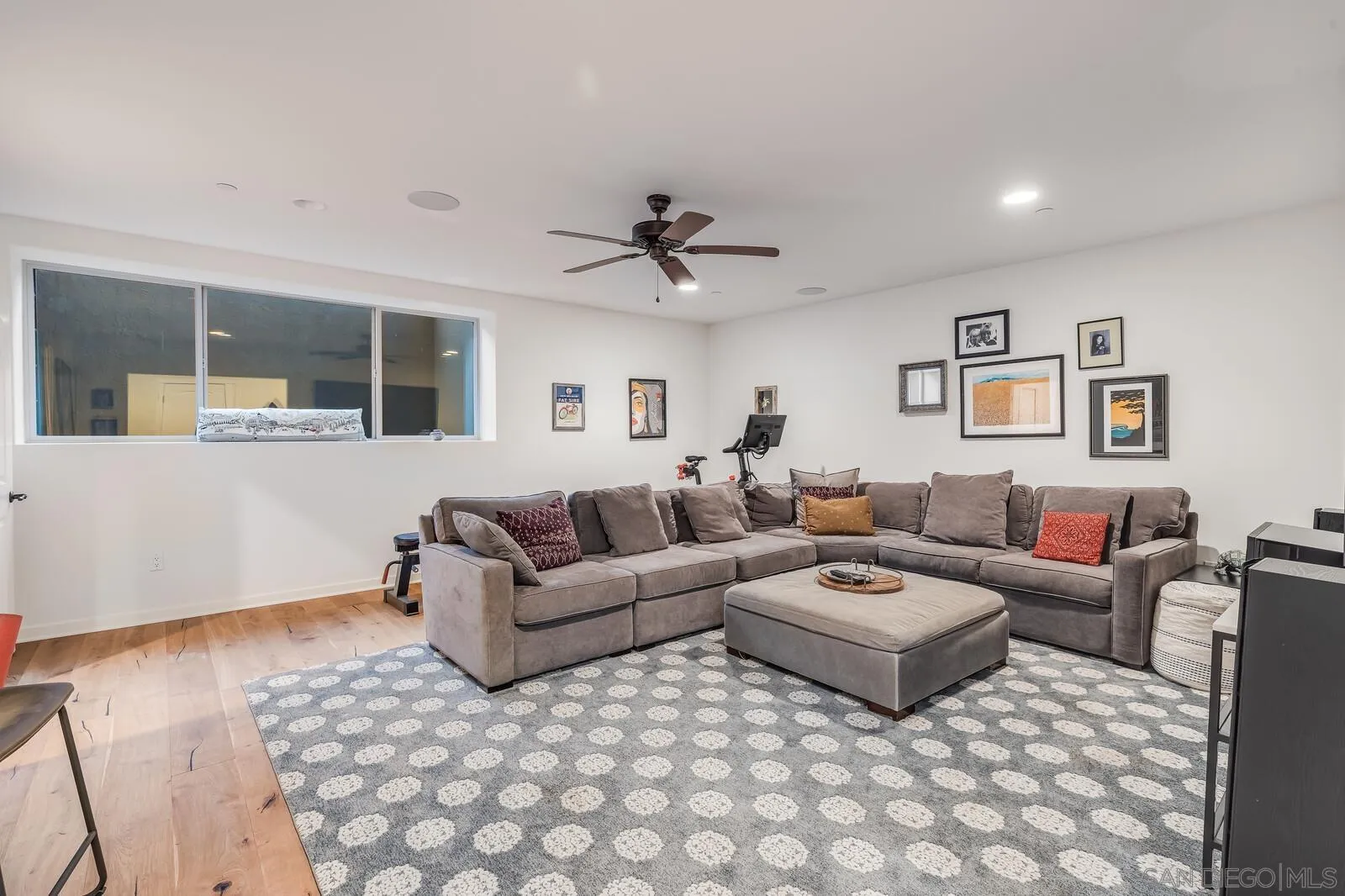 2009 MacKinnon Avenue Cardiff, CA 92007 - Photo 32 of 54 a living room with furniture and a window