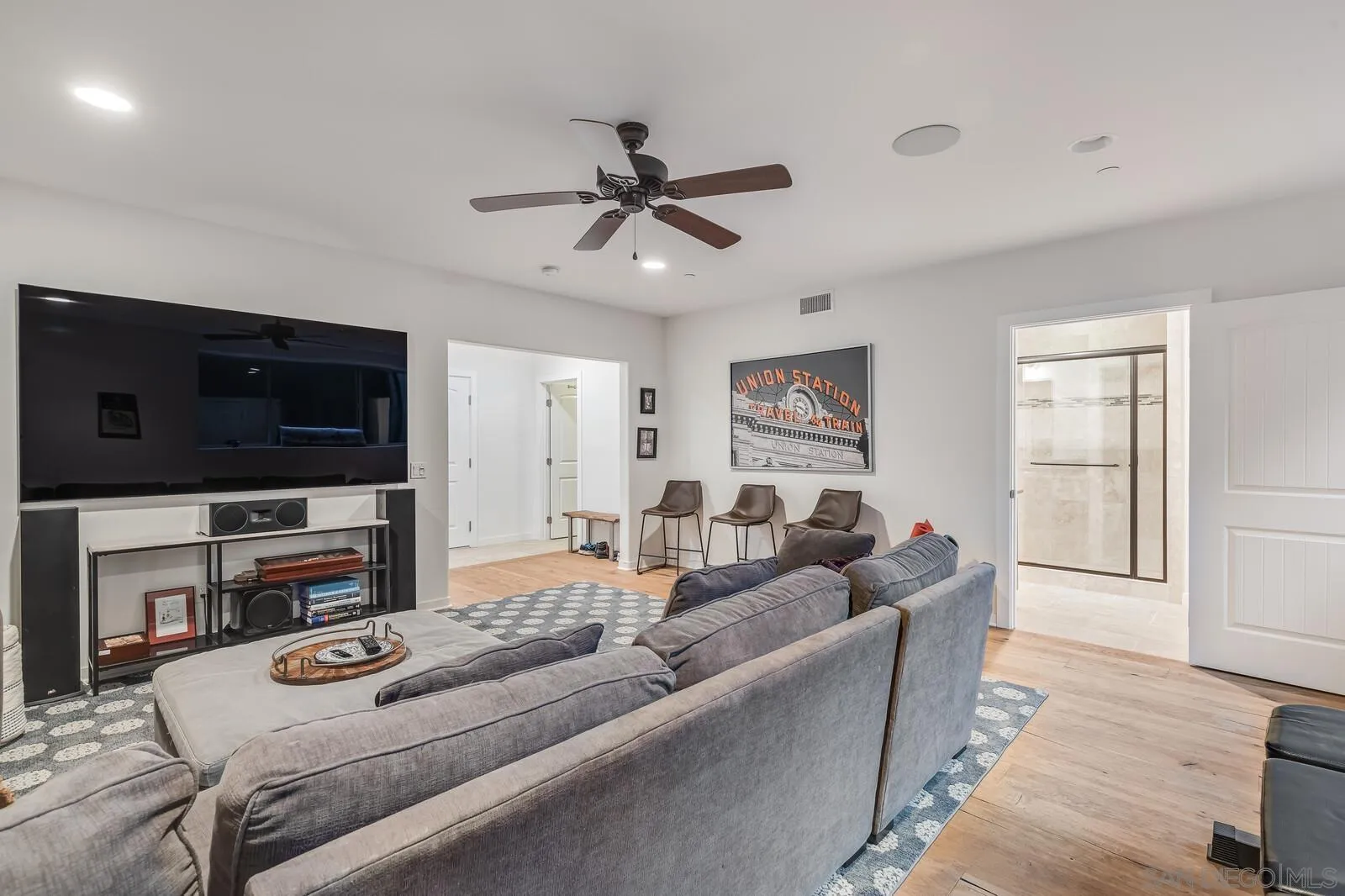 2009 MacKinnon Avenue Cardiff, CA 92007 - Photo 33 of 54 a living room with furniture and a flat screen tv