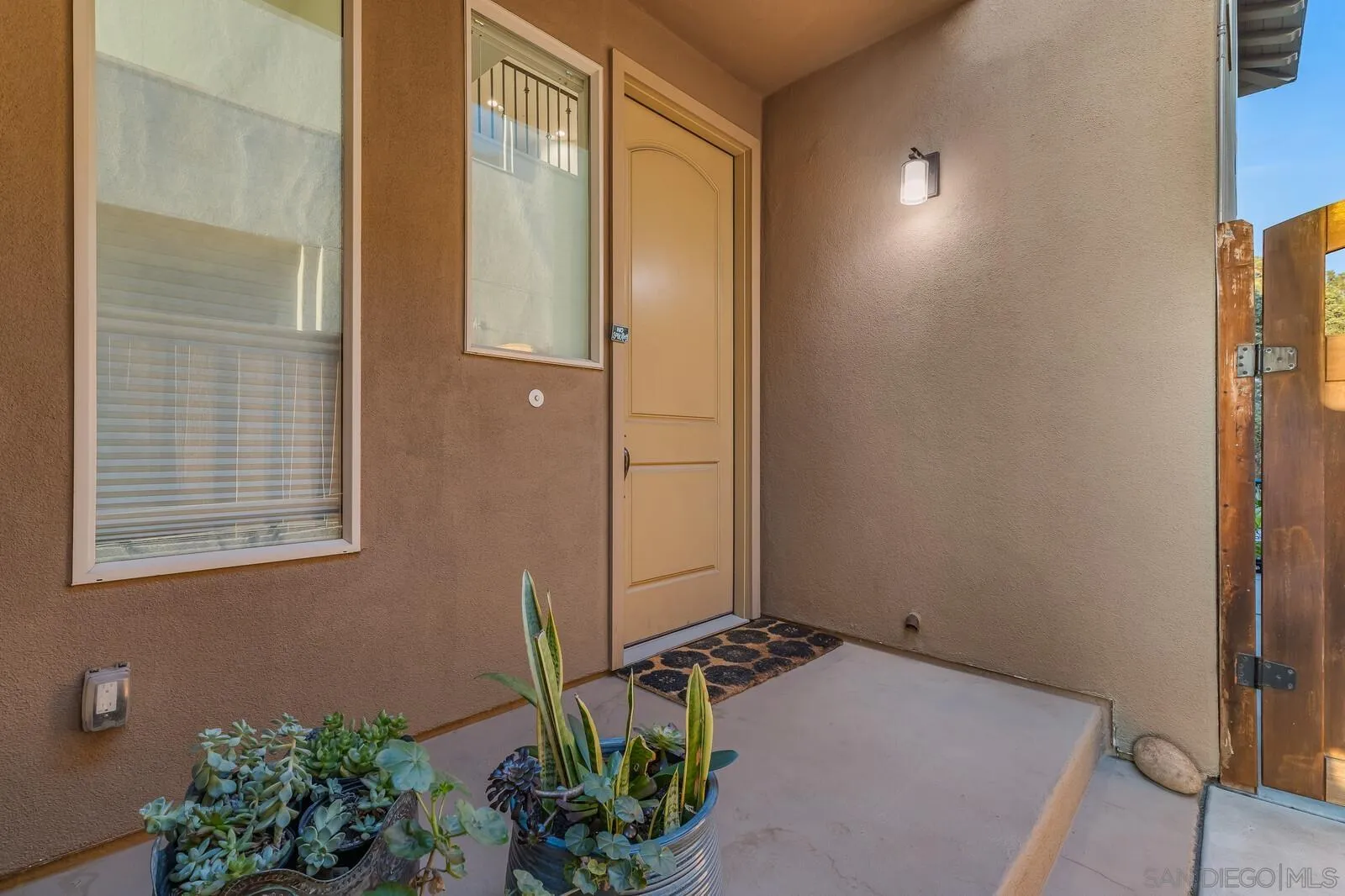 2009 MacKinnon Avenue Cardiff, CA 92007 - Photo 4 of 54 a bathroom with a granite countertop sink and a mirror