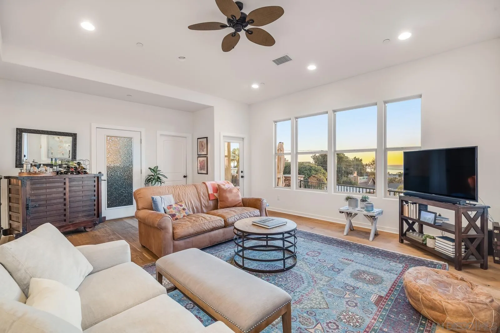 2009 MacKinnon Avenue Cardiff, CA 92007 - Photo 6 of 54 a living room with furniture and a flat screen tv