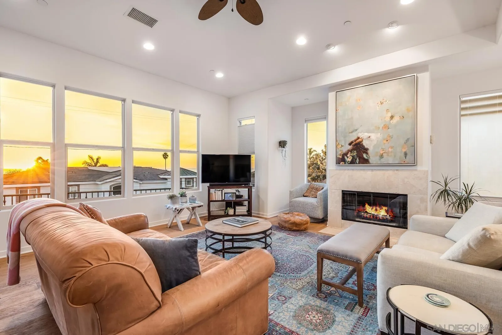 2009 MacKinnon Avenue Cardiff, CA 92007 - Photo 7 of 54 a living room with furniture fireplace and a flat screen tv