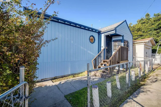 a house view with a backyard space