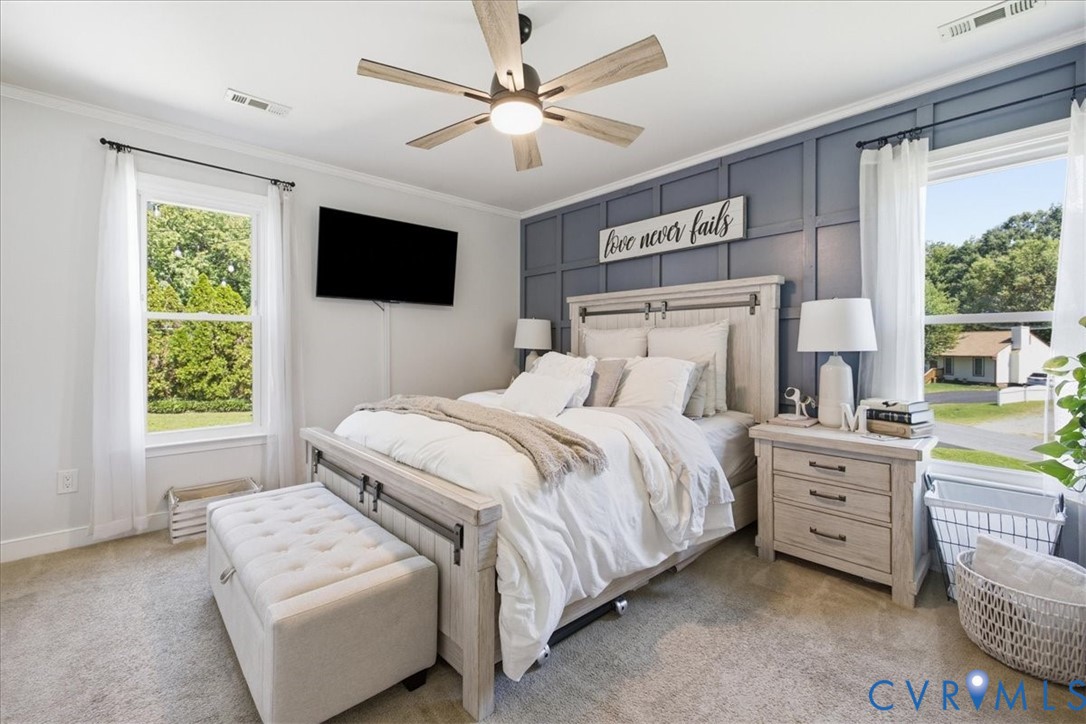 7900 Valencia Road Chesterfield, VA 23832 - Photo 15 of 37 Accent wall with grid paneling, ceiling fan with i