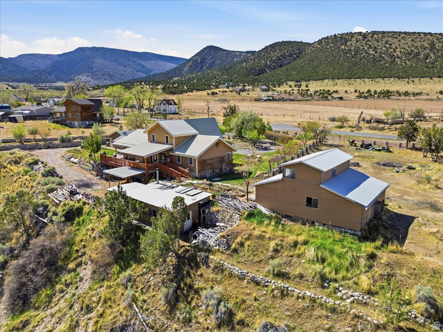 811 East Canyon Road Mayfield, UT 84643 - Photo 45 of 57 Terraced property with multiple structures featuring mountain and valley backdrops