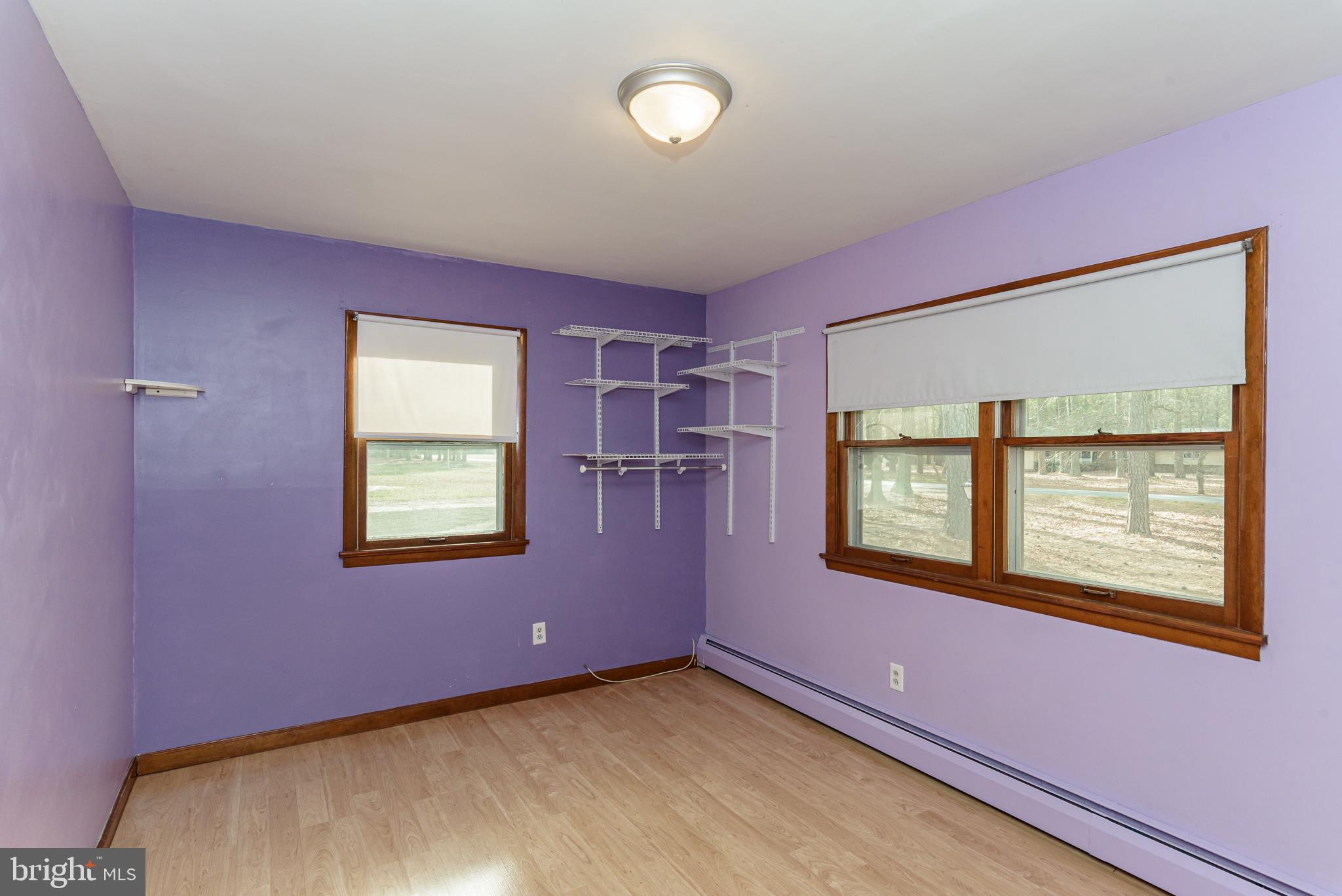 1745 Buck Harbor Road Pocomoke City, MD 21851 - Photo 15 of 29 a view of an empty room with a window
