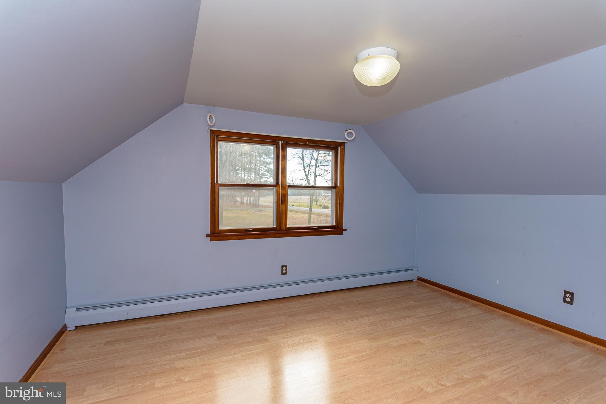 1745 Buck Harbor Road Pocomoke City, MD 21851 - Photo 21 of 29 an empty room with a window