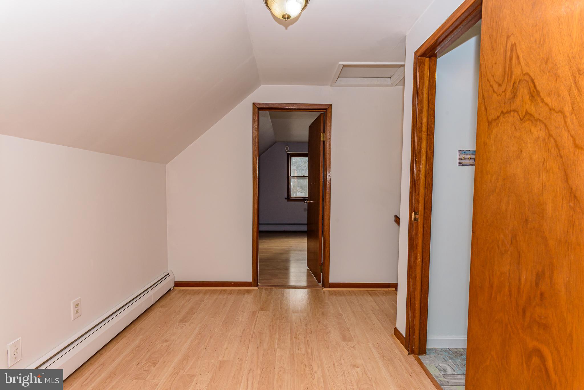 1745 Buck Harbor Road Pocomoke City, MD 21851 - Photo 23 of 29 a view of empty room with wooden floor and fan