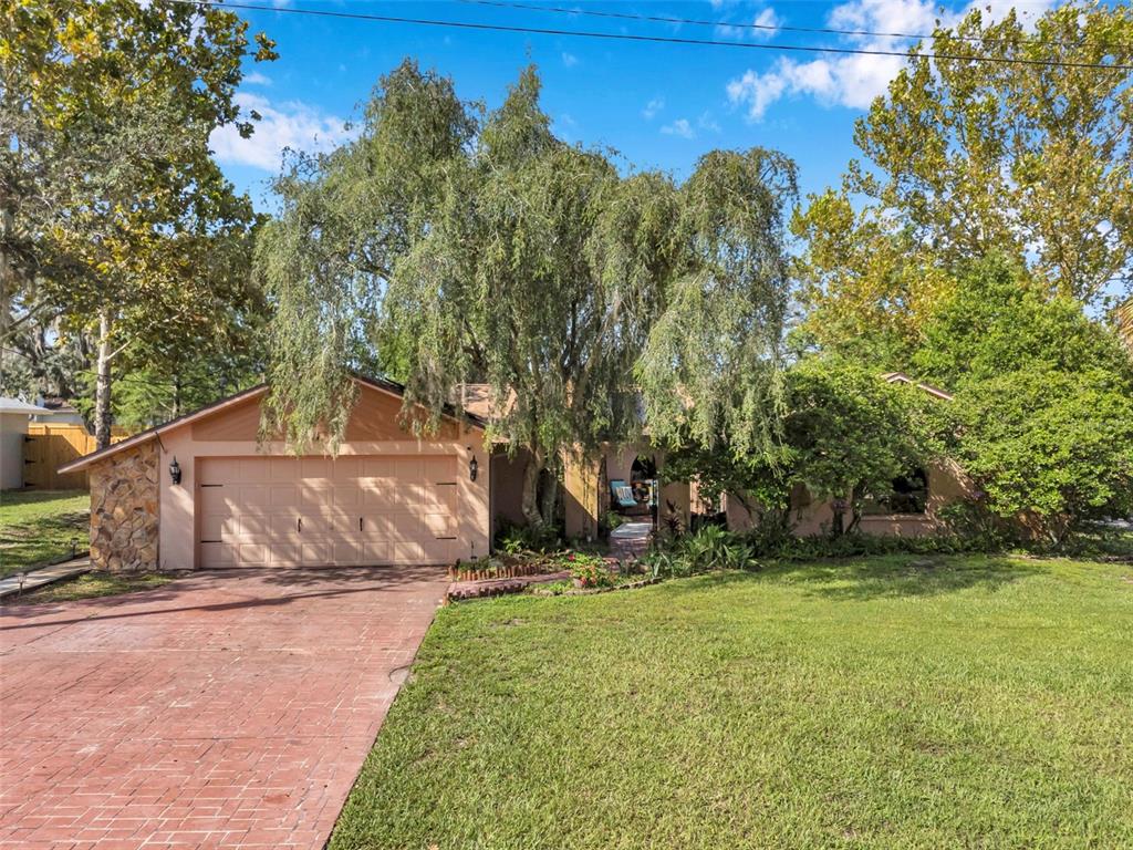 11334 Redgate Street Spring Hill, FL 34609 - Photo 59 of 67 a view of a yard