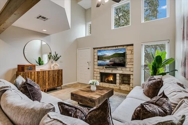 a living room with furniture and a flat screen tv