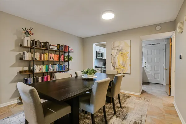 a view of a dining room with furniture