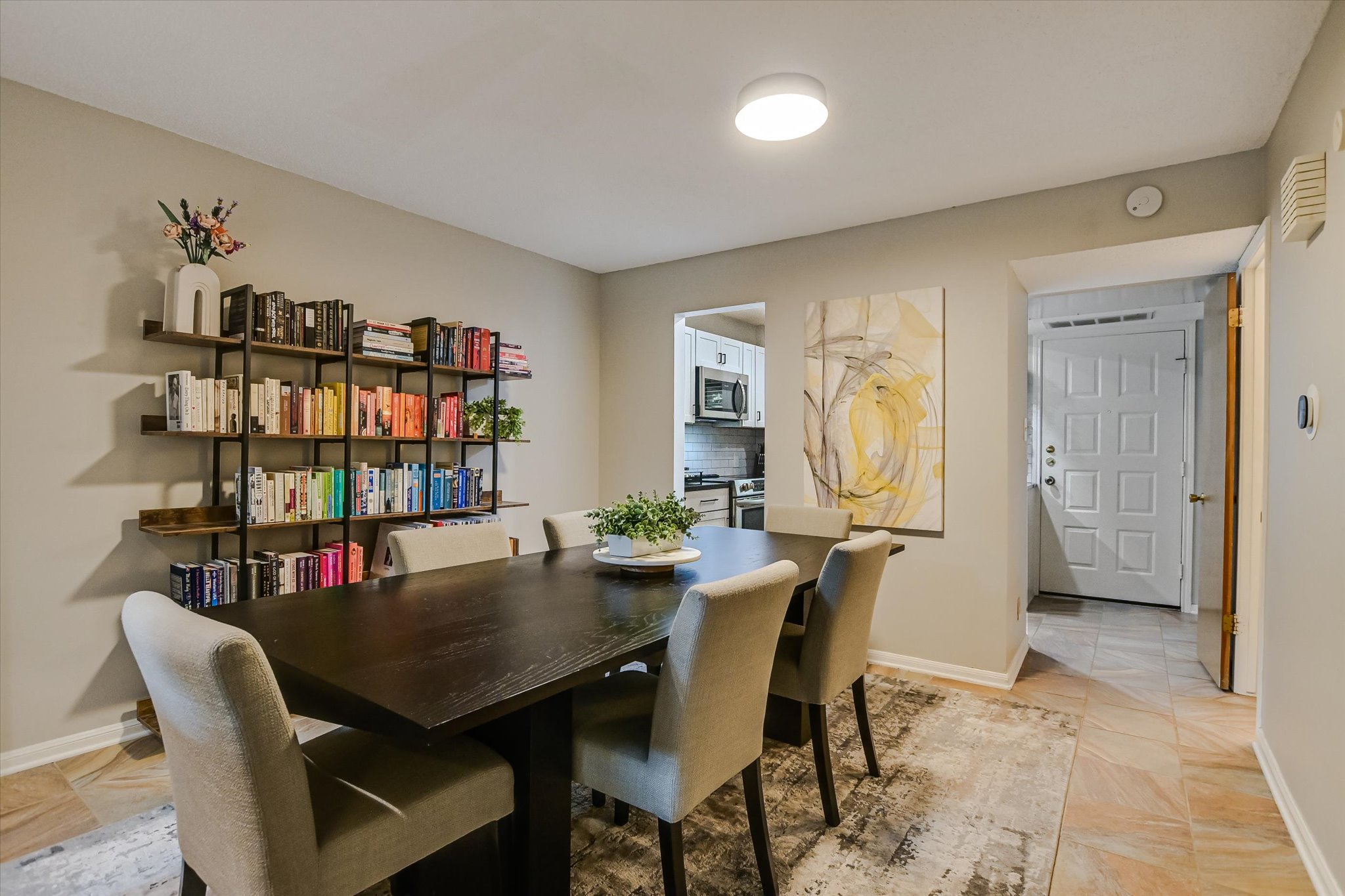 9226 Jollyville Road, Unit 122 Austin, TX 78759 - Photo 12 of 20 a view of a dining room with furniture