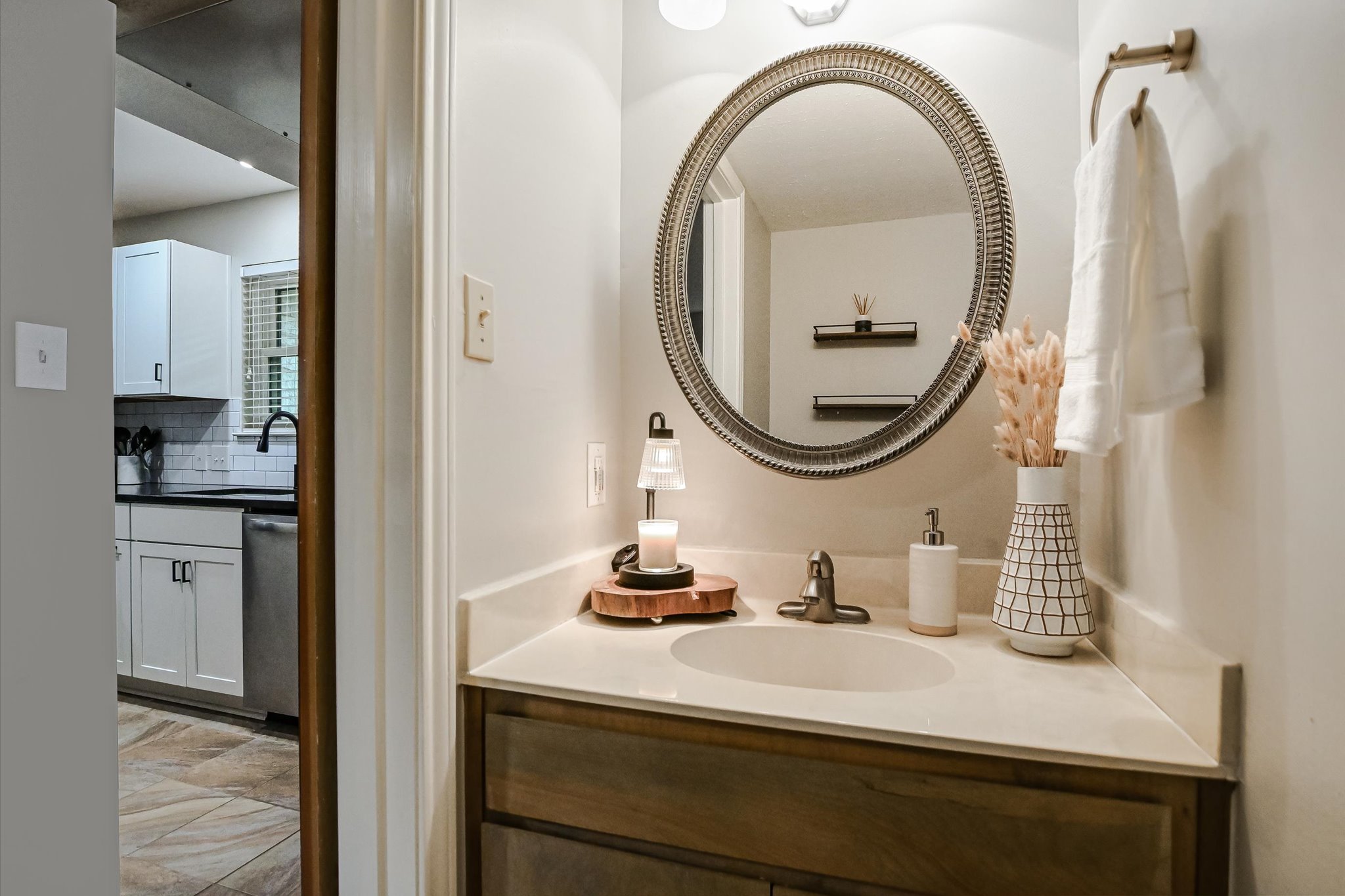 9226 Jollyville Road, Unit 122 Austin, TX 78759 - Photo 5 of 20 a bathroom with a sink and a mirror