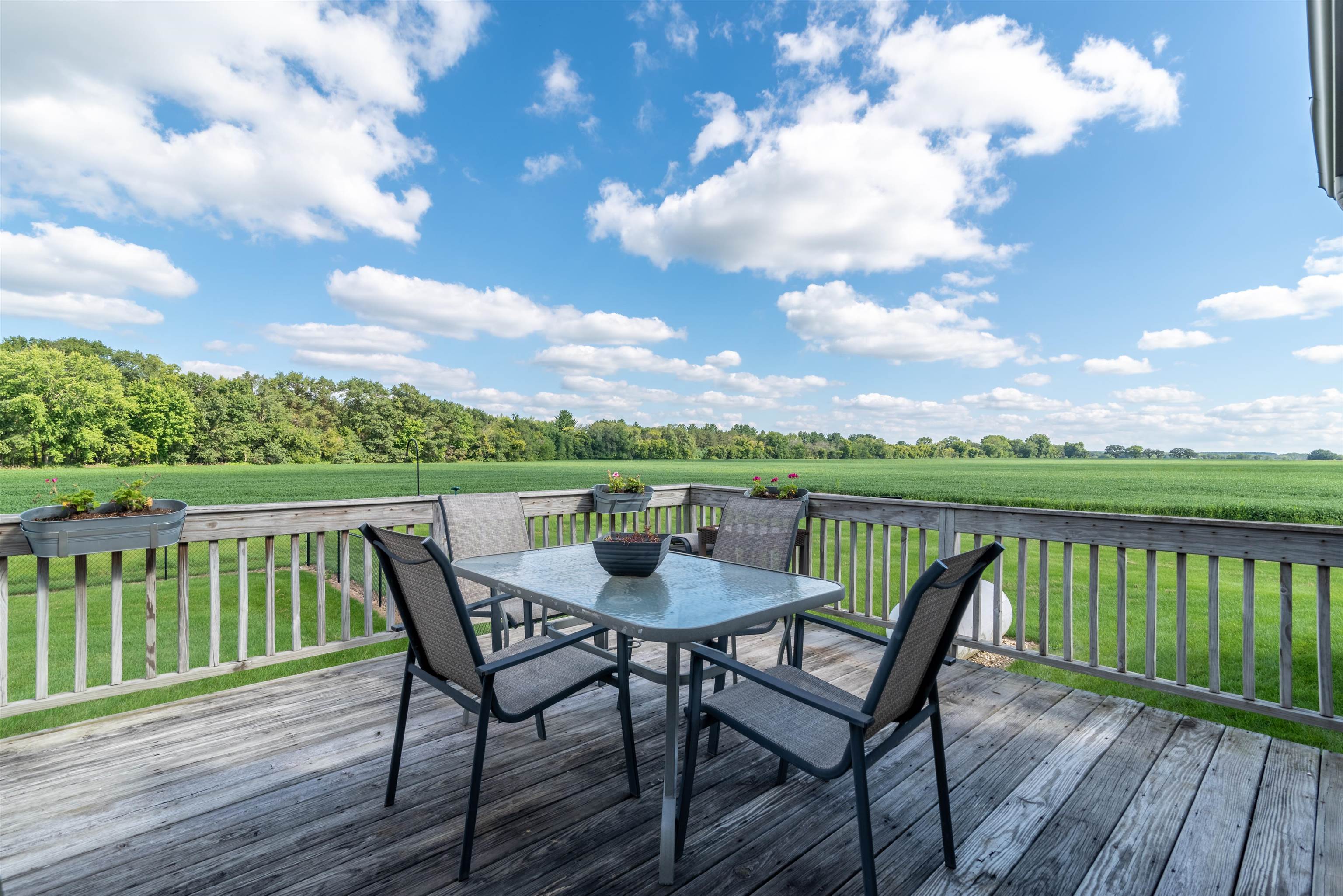 14245 Clover Road Rockton, IL 61072 - Photo 39 of 51 a view of a wooden deck with furniture