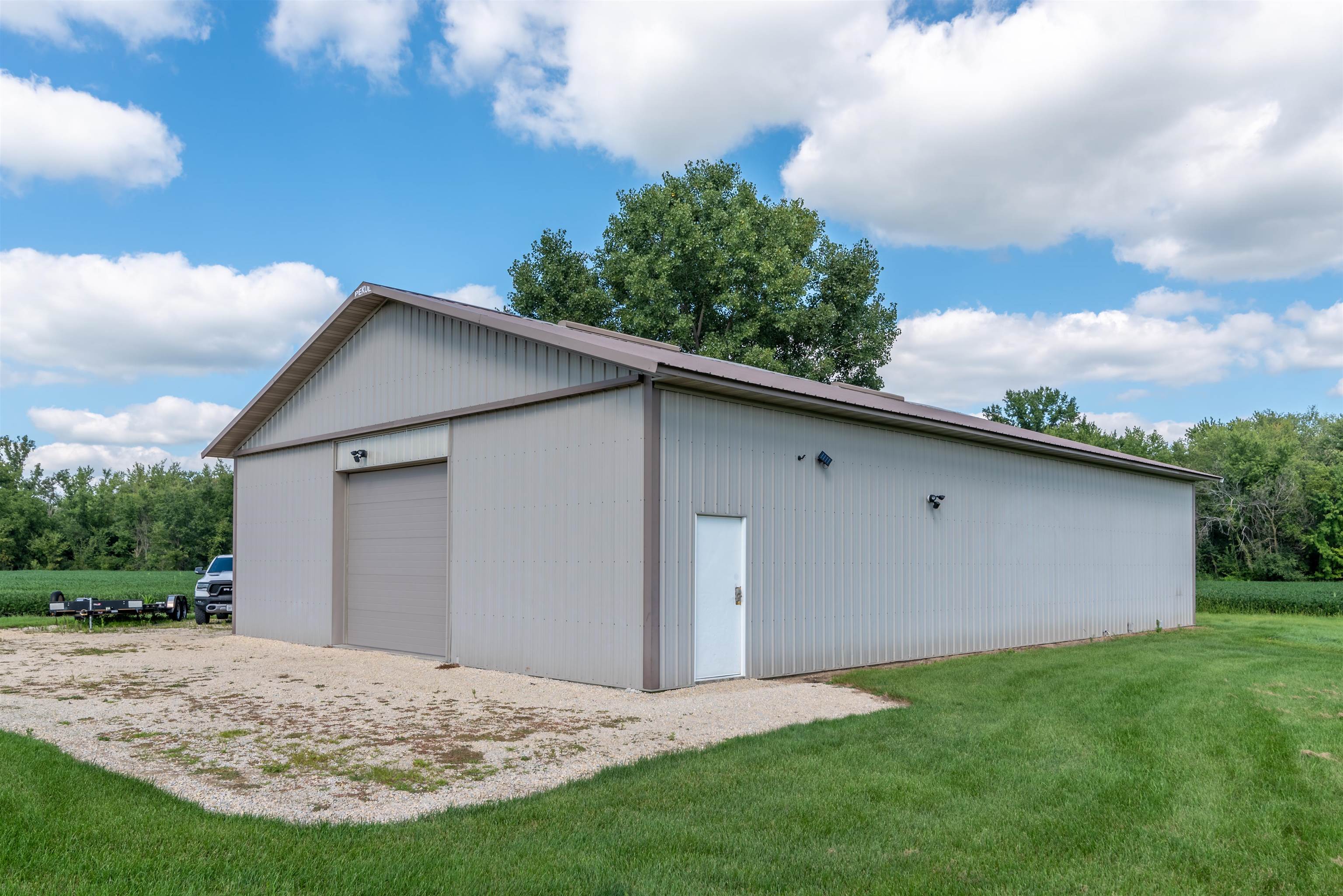 14245 Clover Road Rockton, IL 61072 - Photo 40 of 51 a view of backyard with garage