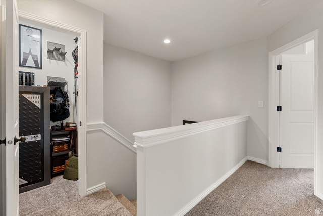 2382 South 1275th Street West Logan, UT 84321 - Photo 16 of 36 At the top of the stairs lies a custom Man Cave Closet... perfect for gun cabinet, or whatever your heart desires!