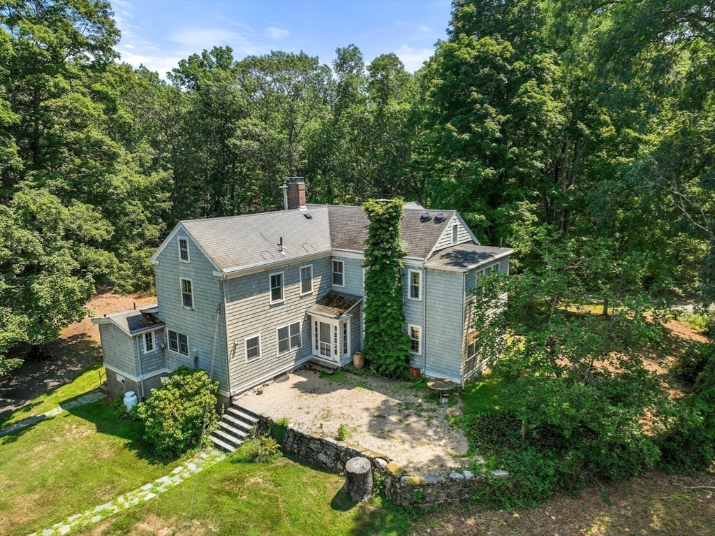 145 Tower Road Lincoln, MA 01773 - Photo 21 of 26 an aerial view of a house with a yard
