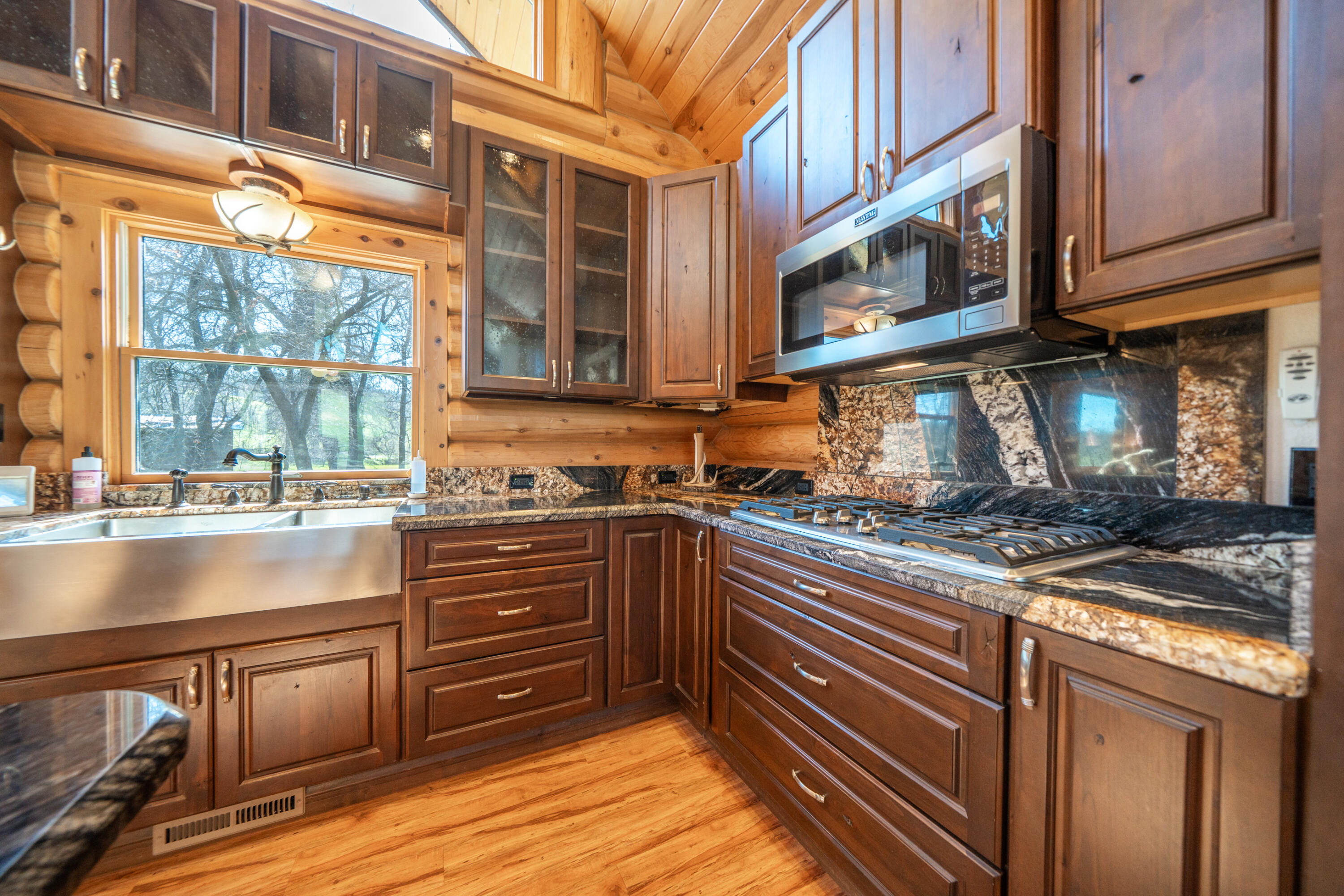 11875 Oak Run Road Oak Run, CA 96069 - Photo 14 of 127 a kitchen with stainless steel appliances granite countertop a stove and a microwave