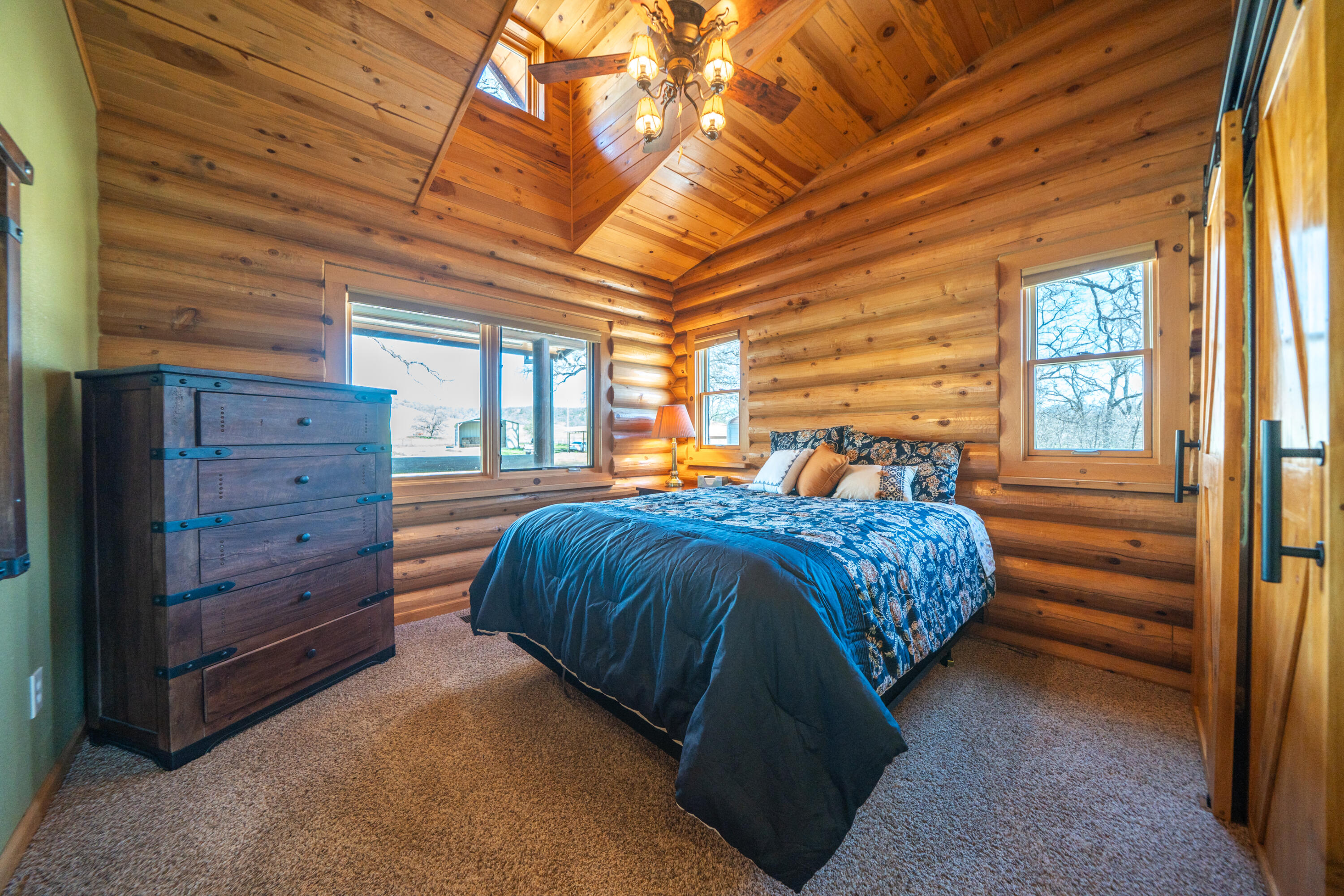 11875 Oak Run Road Oak Run, CA 96069 - Photo 30 of 127 a bedroom with a bed and a dresser