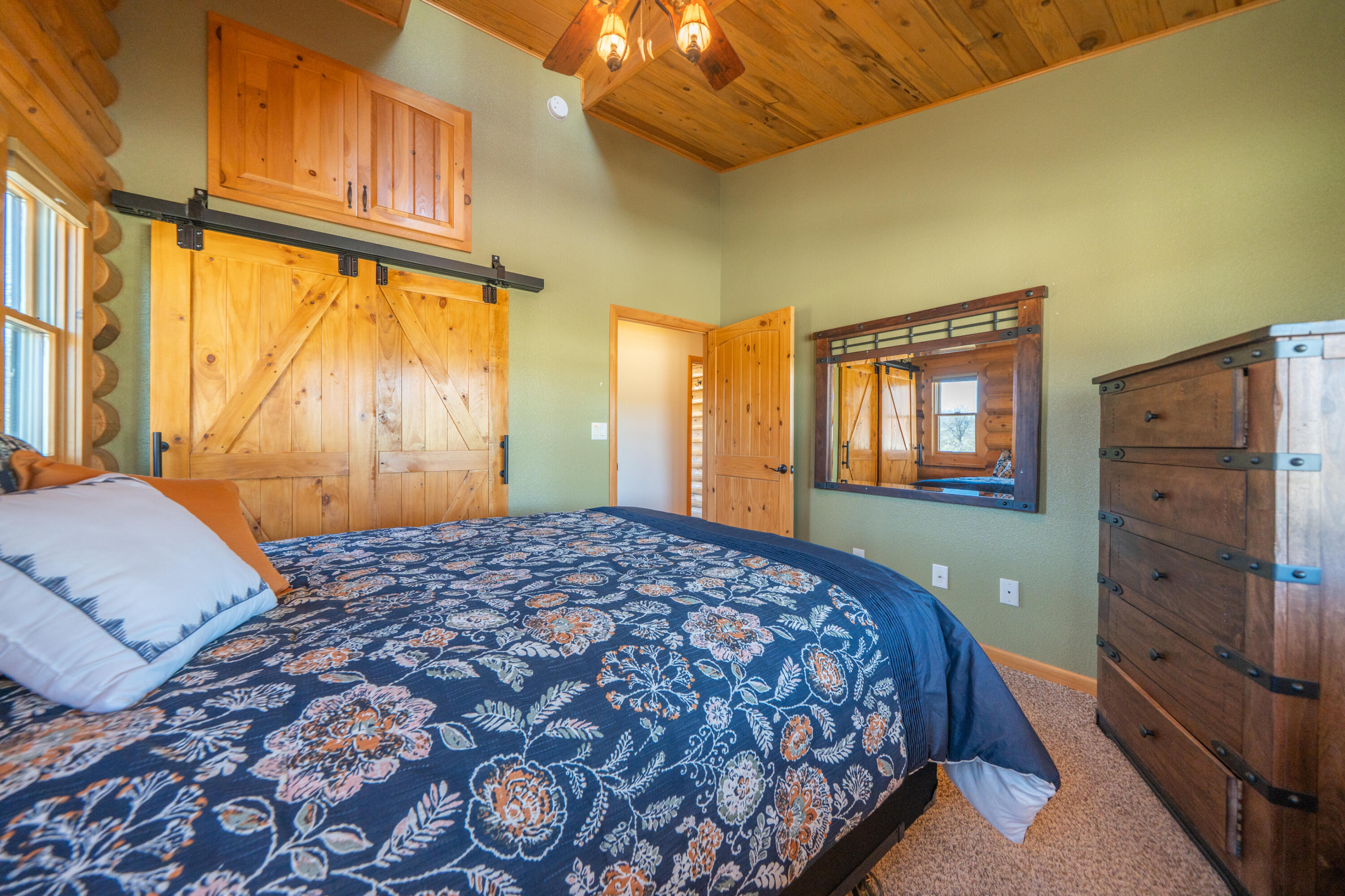 11875 Oak Run Road Oak Run, CA 96069 - Photo 31 of 127 a bedroom with a large bed and a window