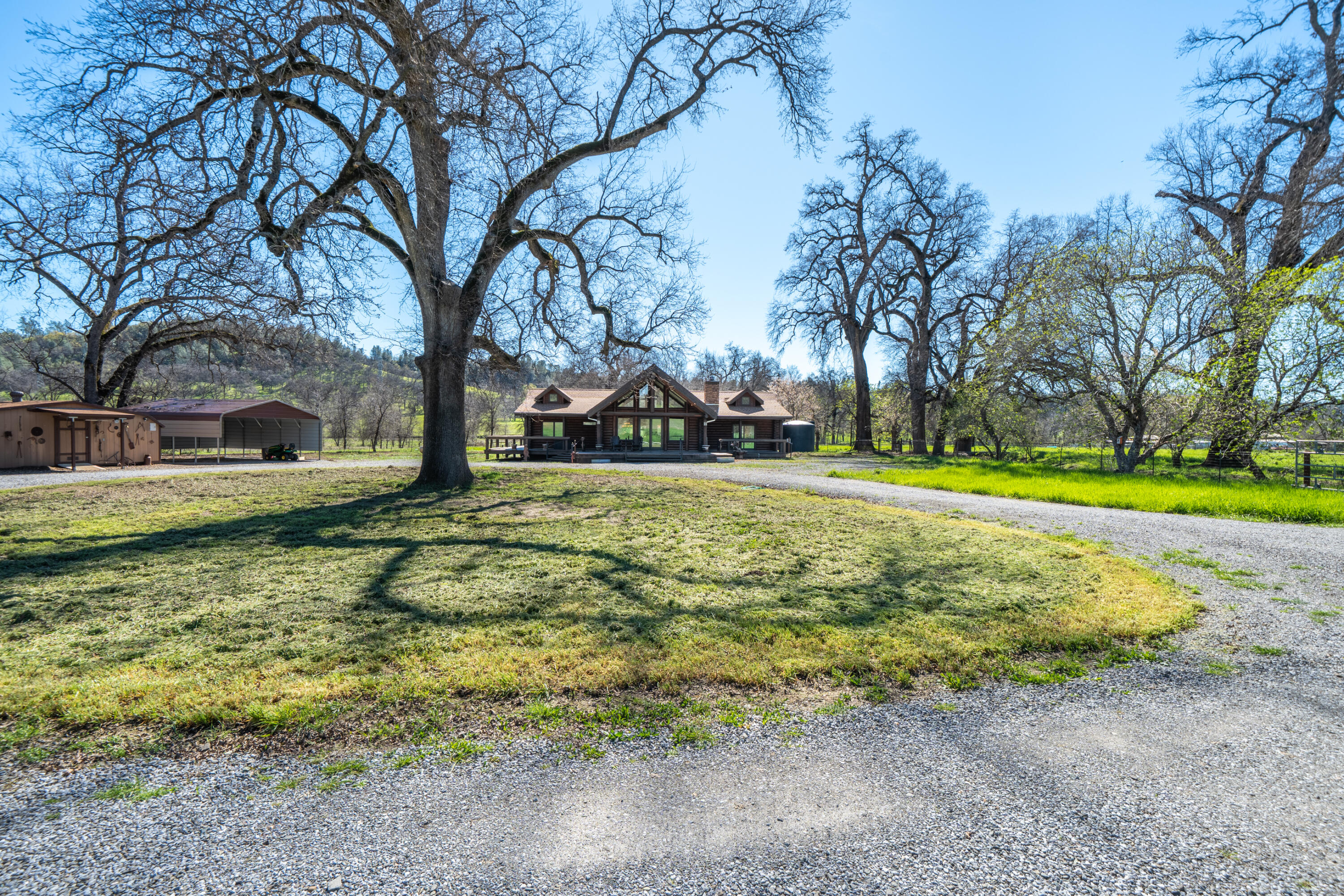 11875 Oak Run Road Oak Run, CA 96069 - Photo 42 of 127 a view of a house with a yard and sitting area