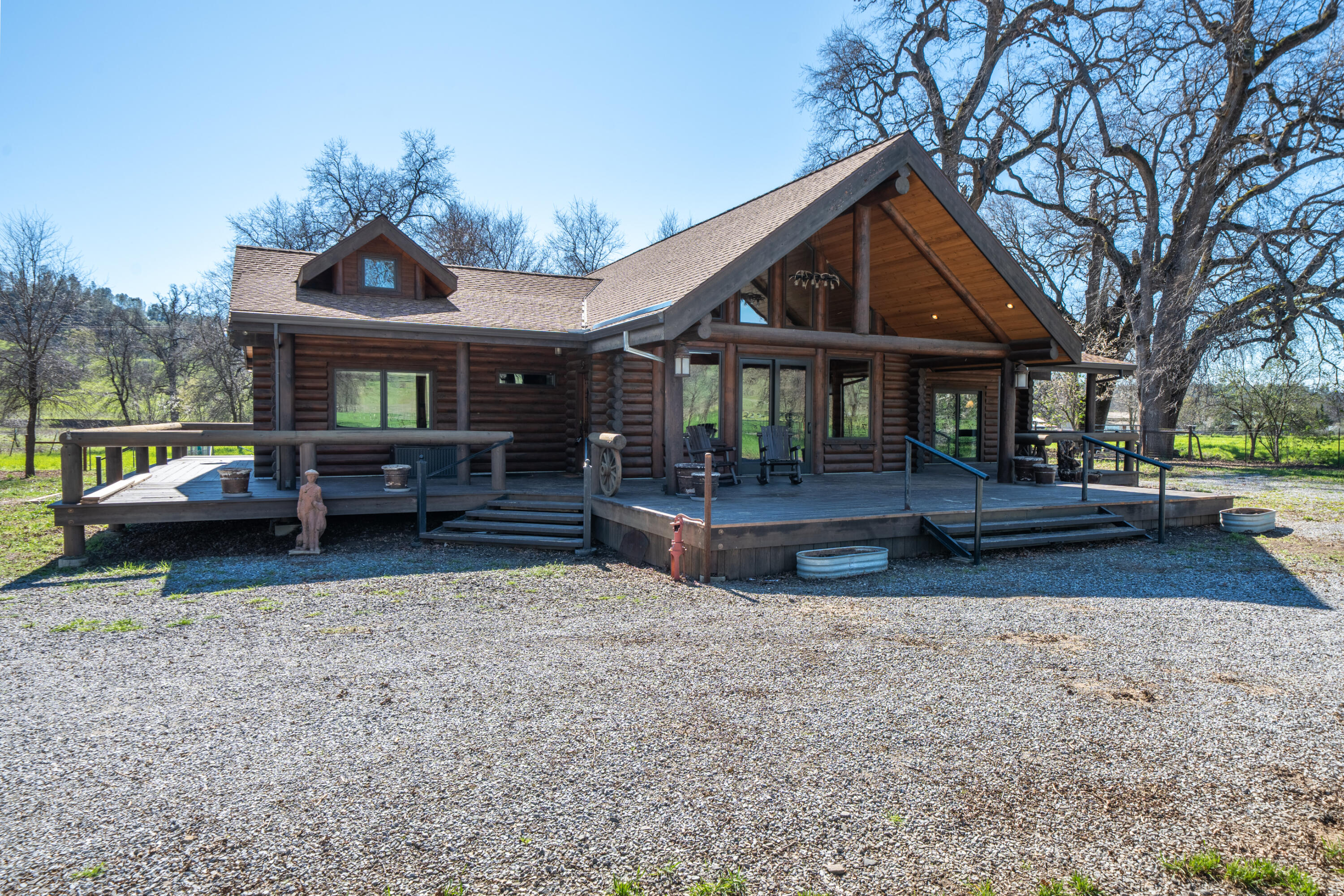 11875 Oak Run Road Oak Run, CA 96069 - Photo 50 of 127 a front view of a house with a yard and garage