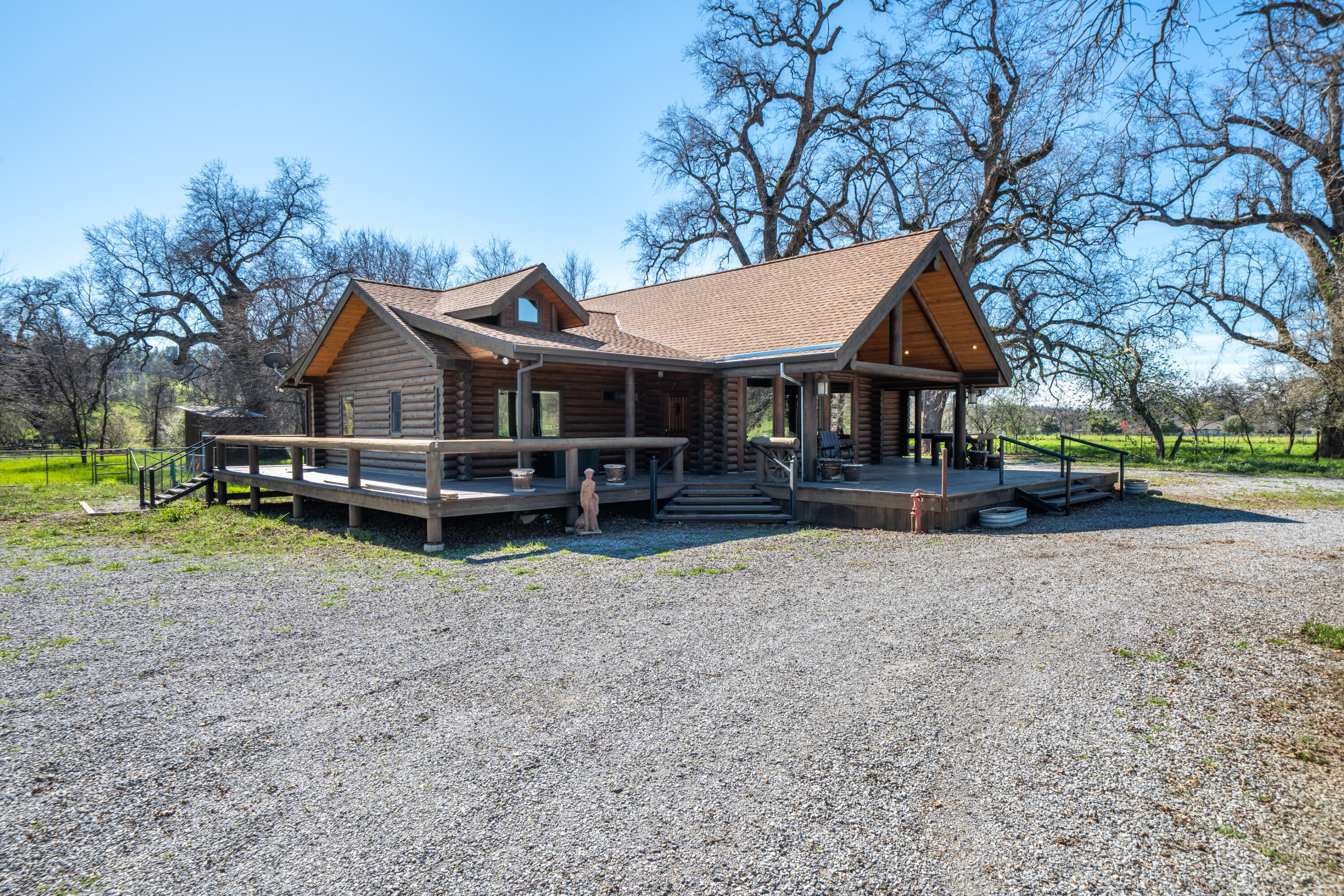 11875 Oak Run Road Oak Run, CA 96069 - Photo 51 of 127 a house with a bench in front of the house