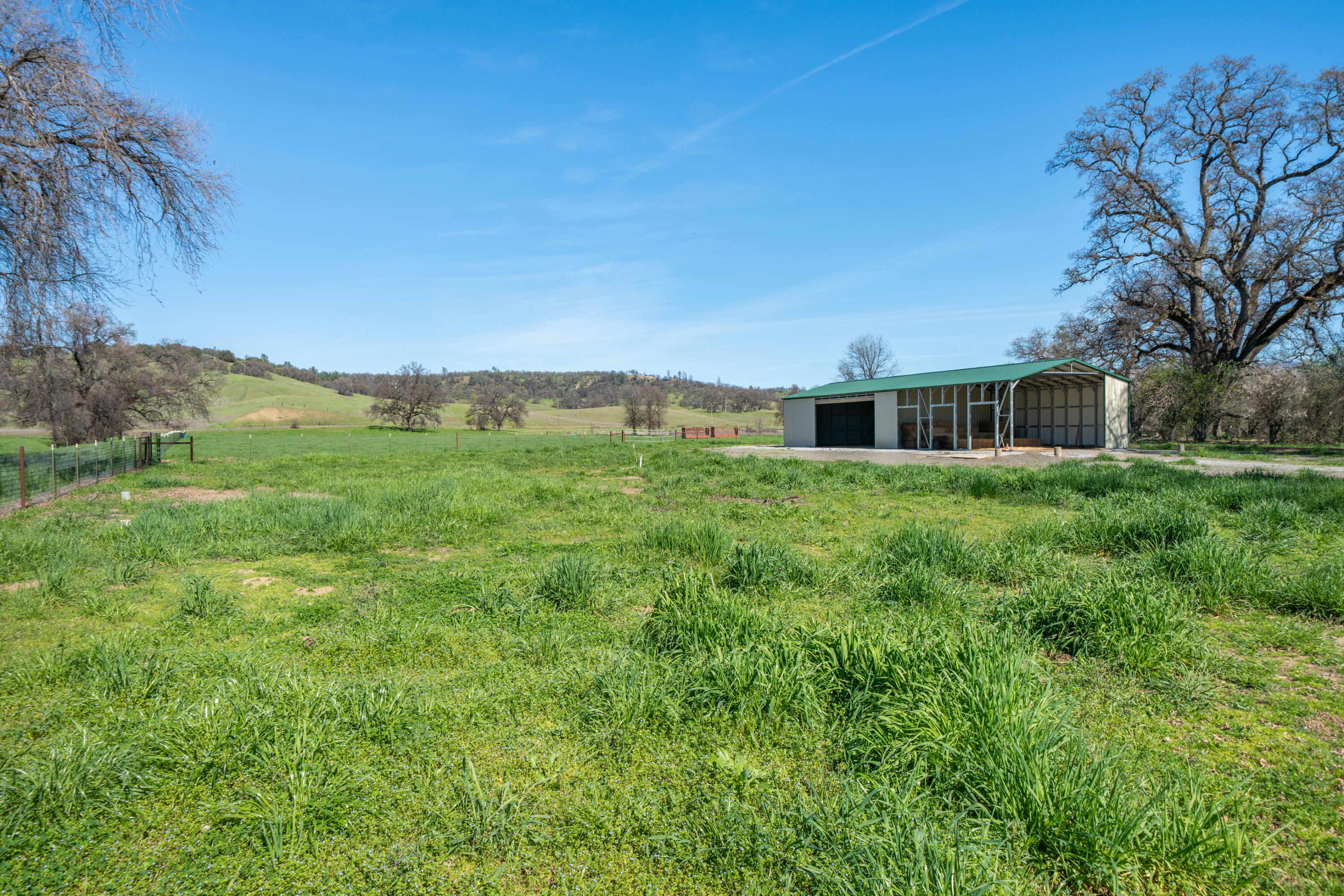 11875 Oak Run Road Oak Run, CA 96069 - Photo 57 of 127 a view of a house with a yard and sitting area