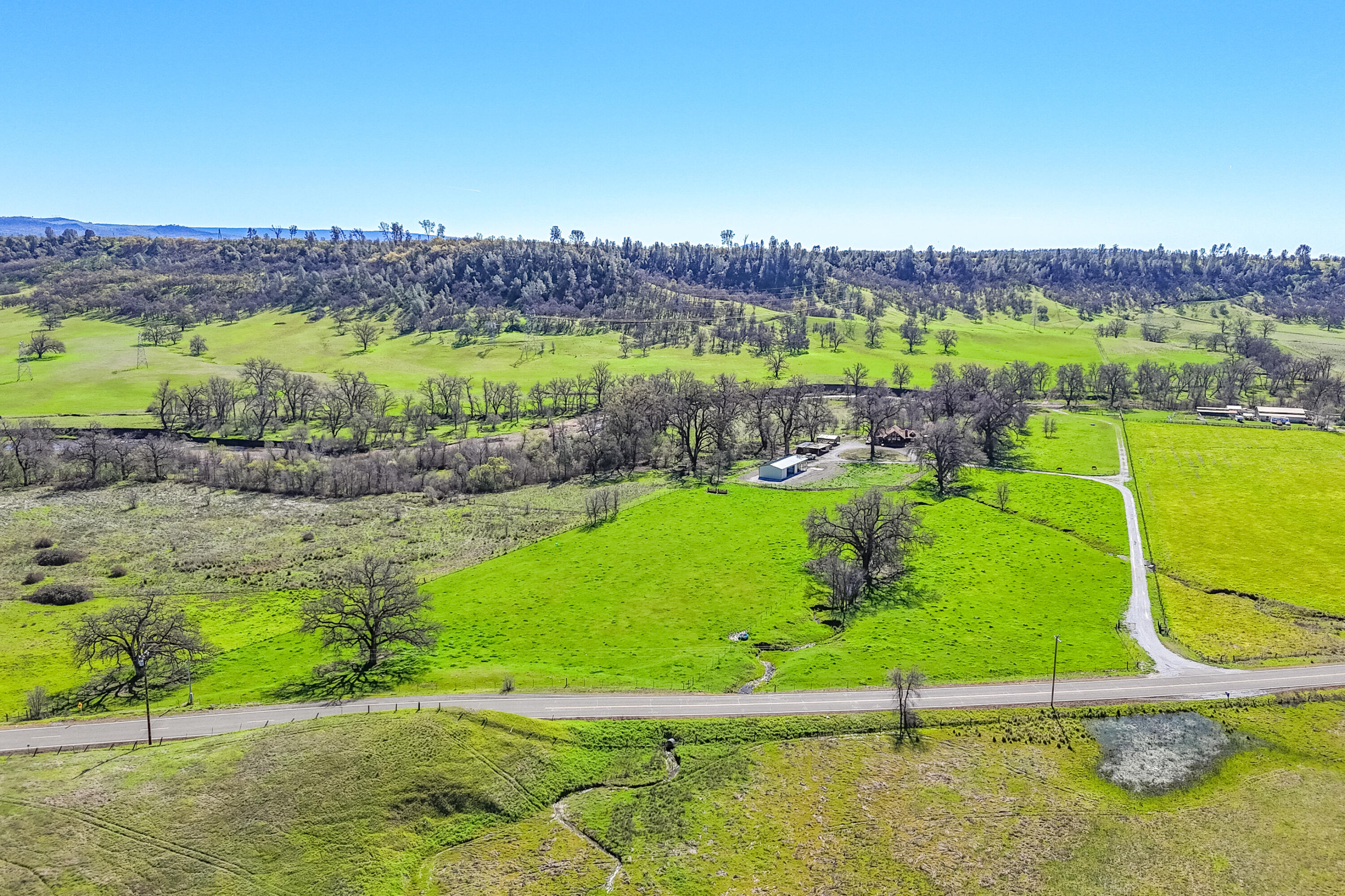 11875 Oak Run Road Oak Run, CA 96069 - Photo 80 of 127 an aerial view of a golf course with a swimming pool