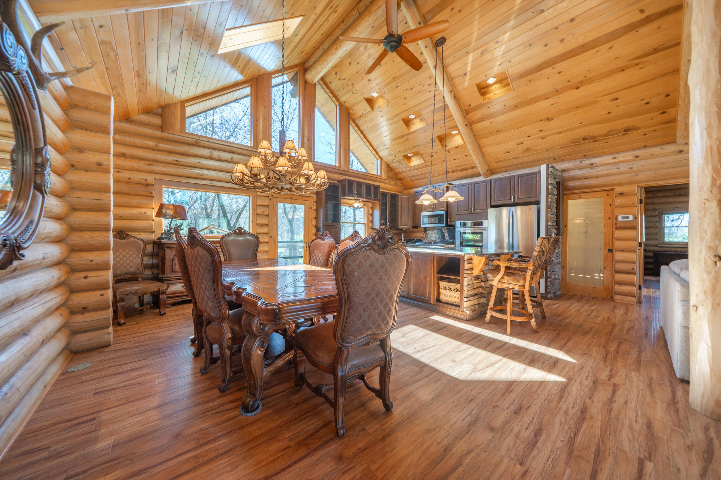 11875 Oak Run Road Oak Run, CA 96069 - Photo 9 of 127 a view of a dining room with furniture and wooden floor