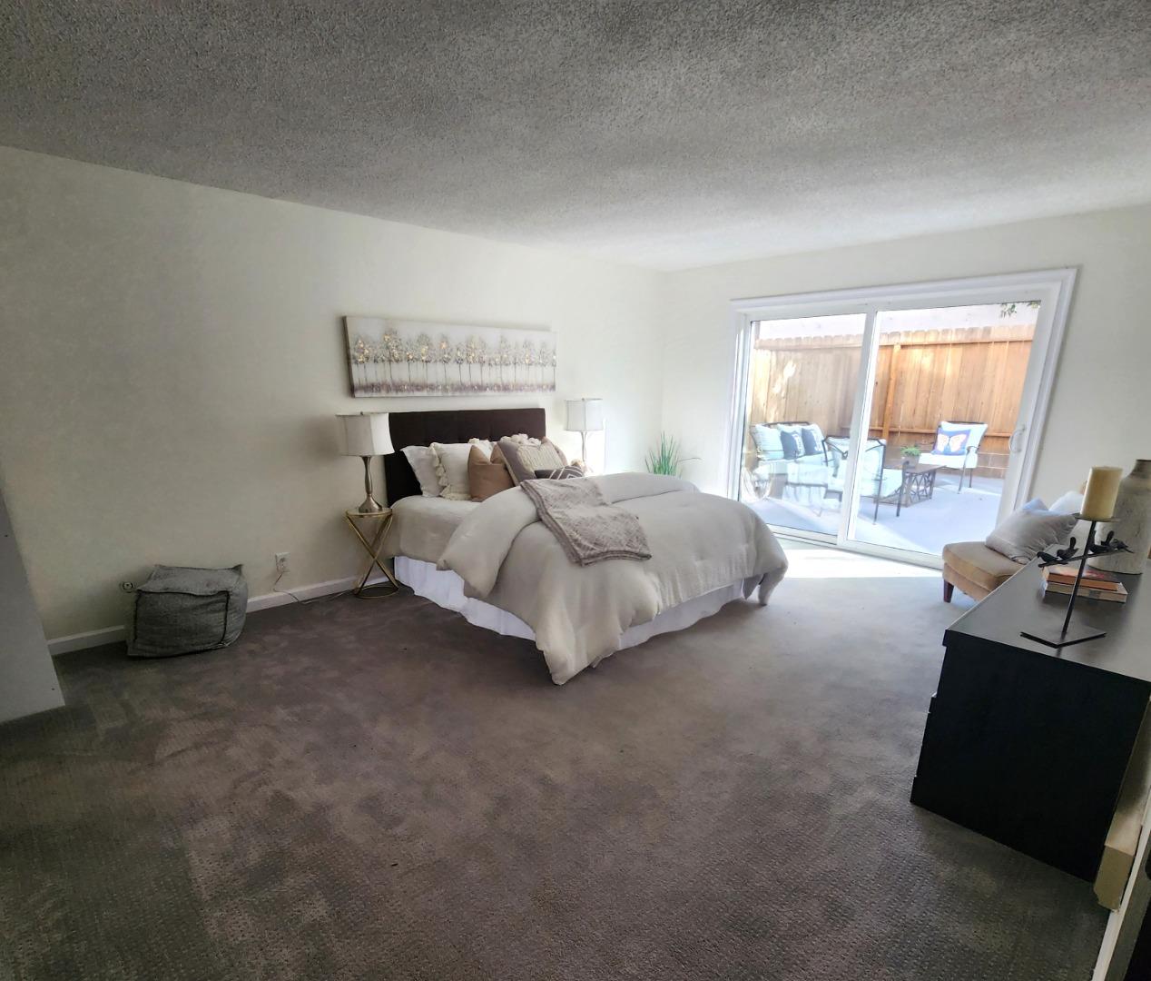 1500 Broadway, Unit 205 Burlingame, CA 94010 - Photo 15 of 24 a bedroom with a bed and a couch