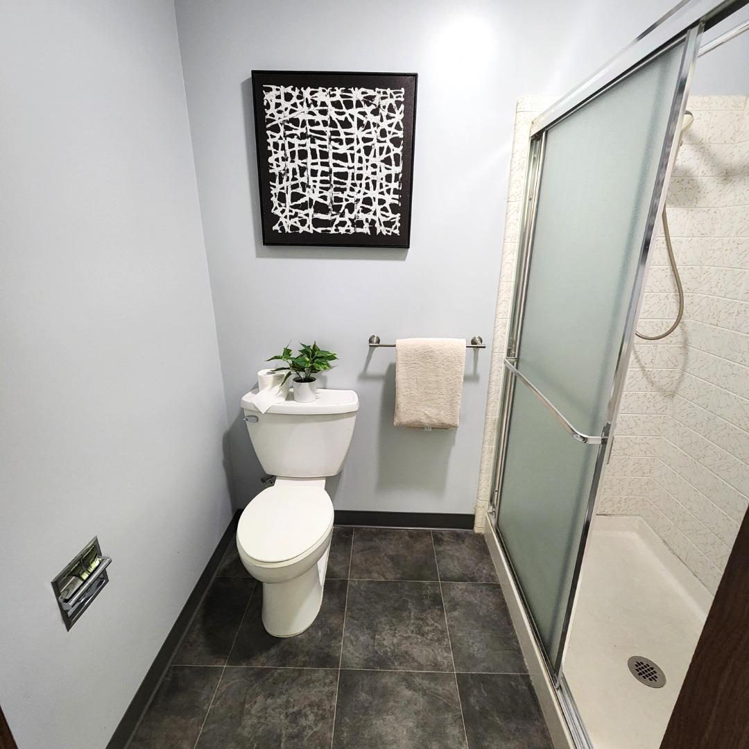 1500 Broadway, Unit 205 Burlingame, CA 94010 - Photo 18 of 24 a bathroom with a toilet and a sink