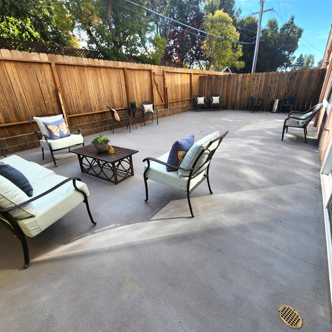 1500 Broadway, Unit 205 Burlingame, CA 94010 - Photo 20 of 24 a view of a yard with furniture and a back yard
