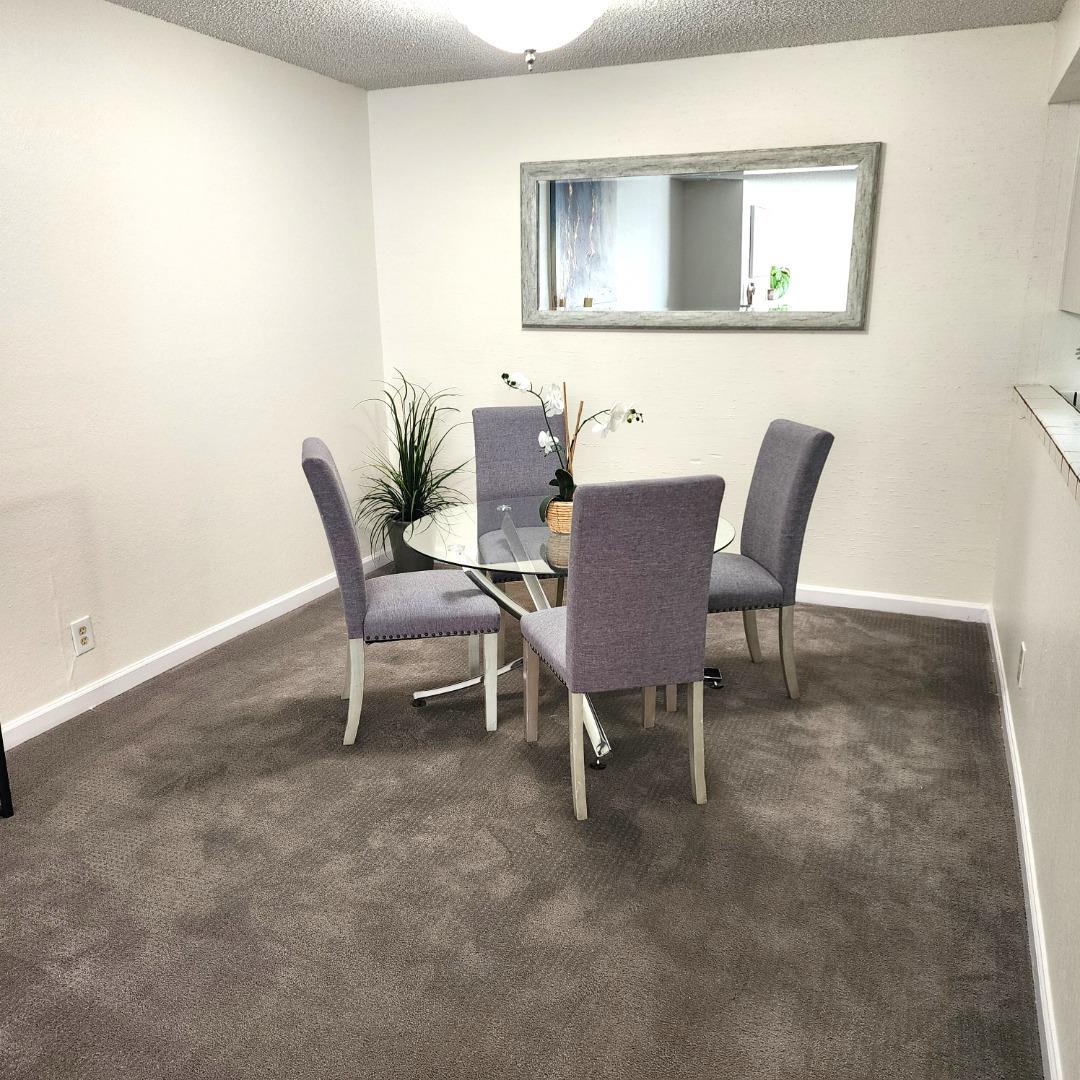 1500 Broadway, Unit 205 Burlingame, CA 94010 - Photo 5 of 24 a view of a dining room with furniture