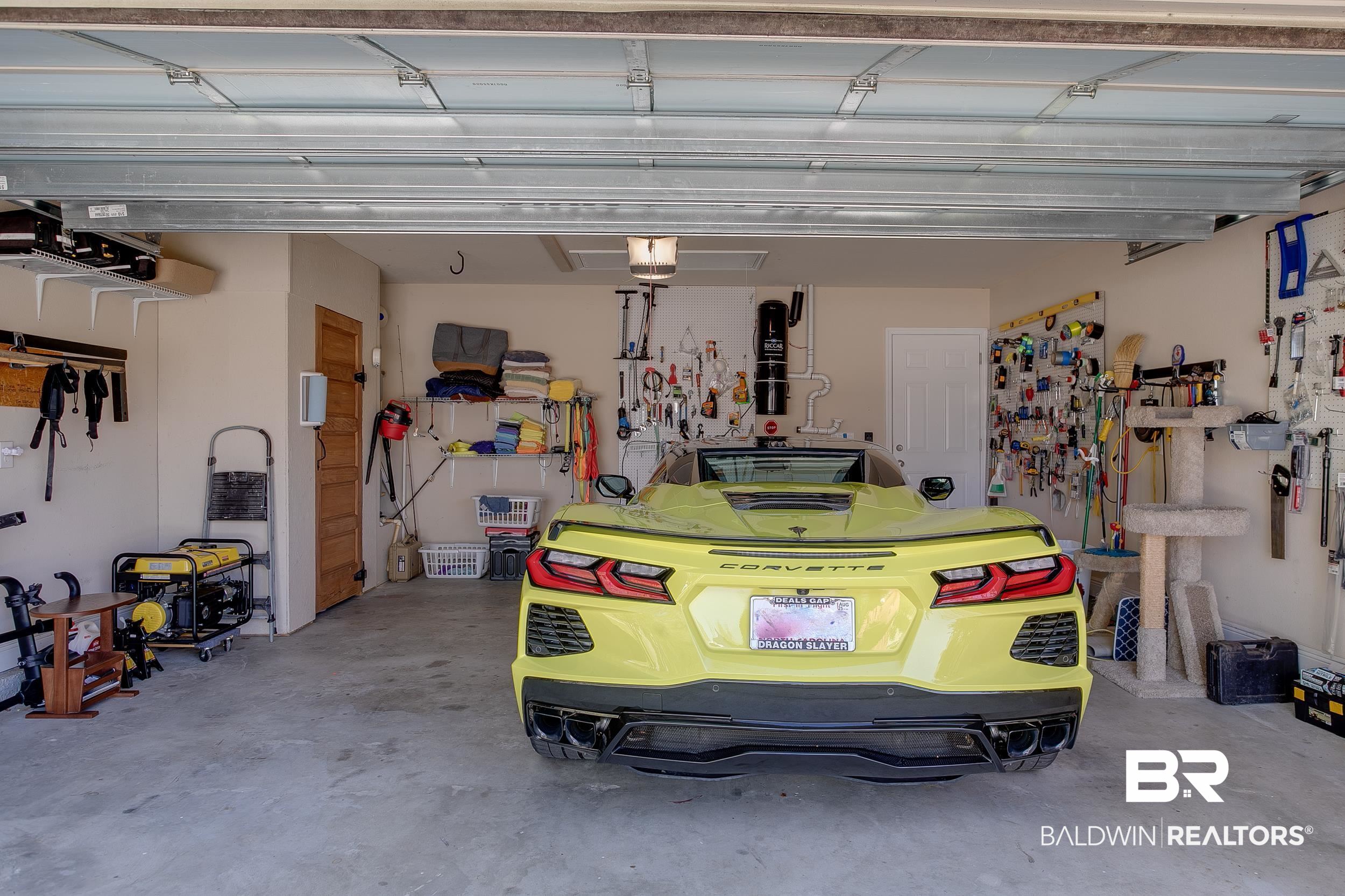13154 Vincent Court Foley, AL 36535 - Photo 40 of 41 Garage featuring a garage door opener
