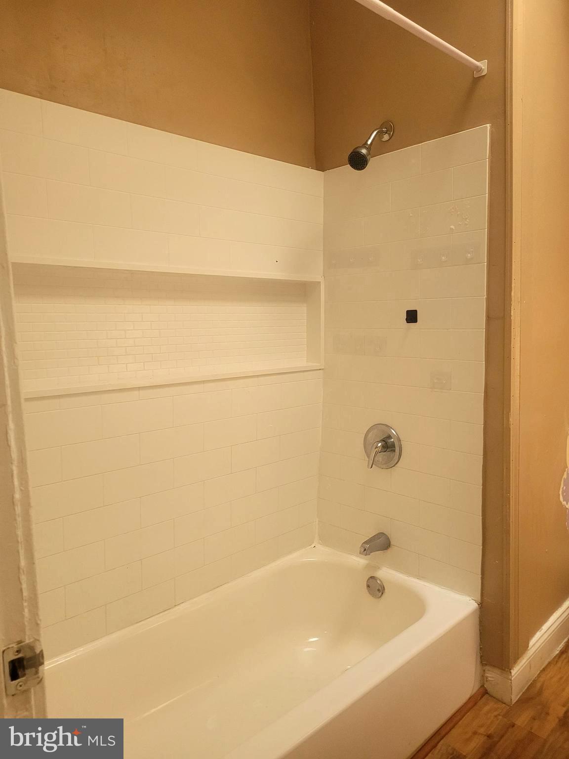 5563 Blakemore Street Philadelphia, PA 19138 - Photo 8 of 14 a bathroom with a bathtub