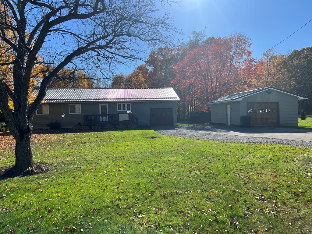 3958 Georgetown Road Polk, PA 16342 - Photo 3 of 20 a view of house with a yard