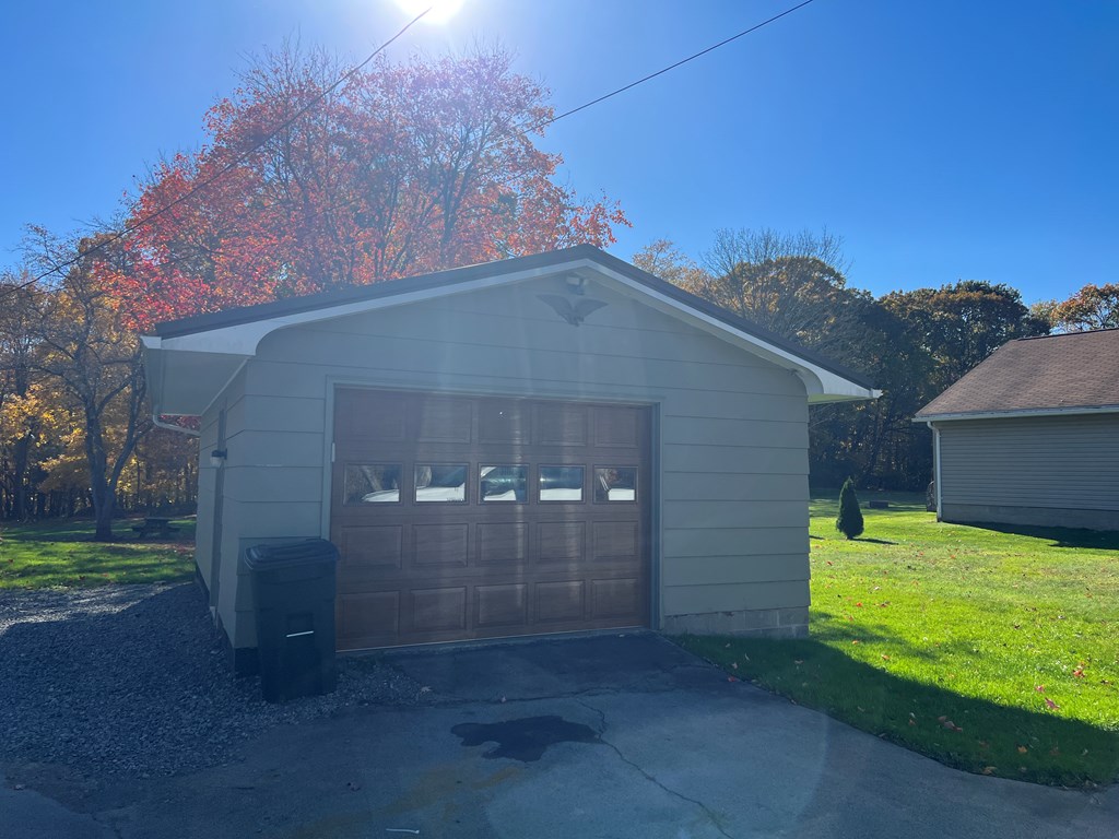 3958 Georgetown Road Polk, PA 16342 - Photo 4 of 20 a backyard of a house with yard and outdoor seating