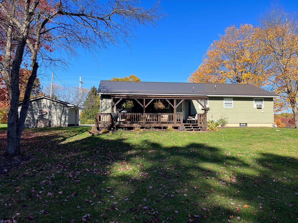 3958 Georgetown Road Polk, PA 16342 - Photo 8 of 20 a view of a house with a yard