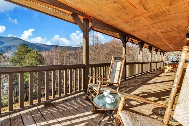 a view of porch with wooden floor