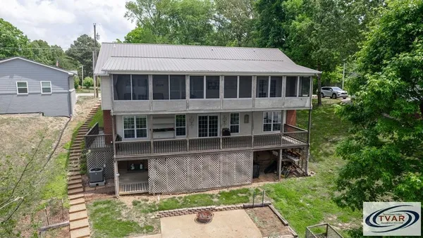 a aerial view of a house with a yard
