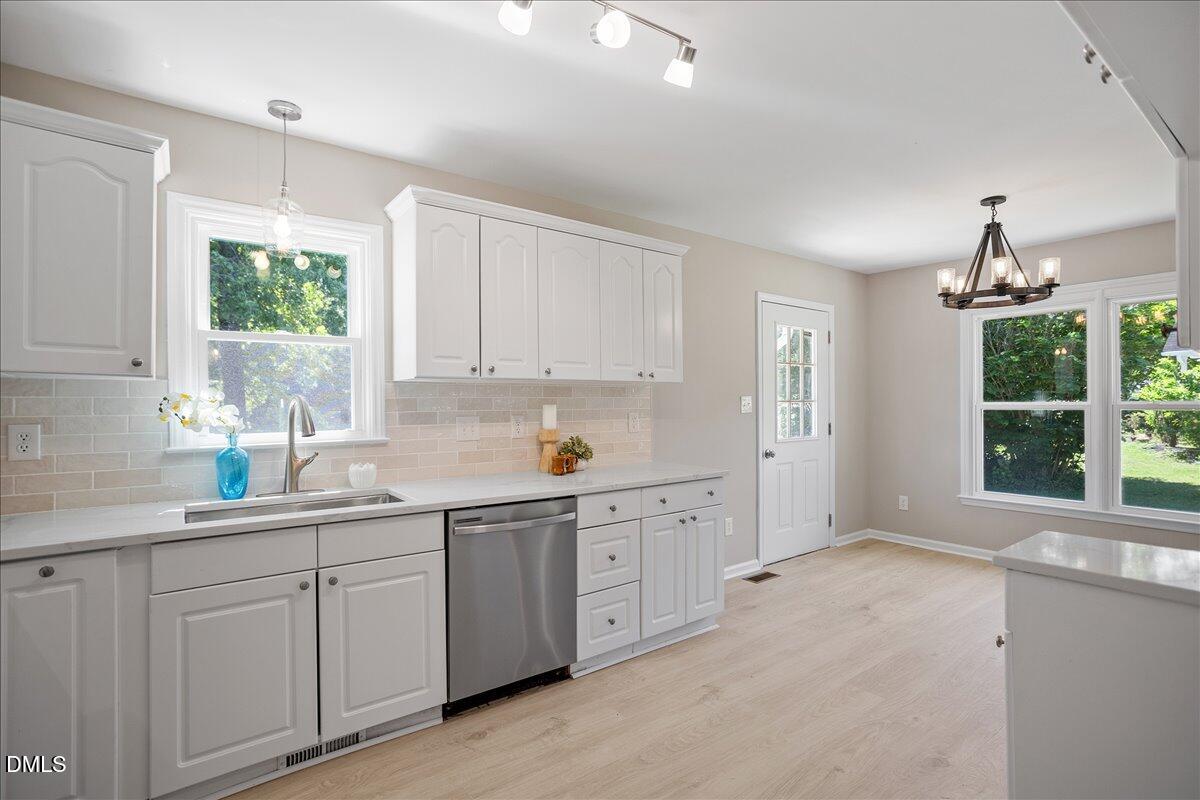 31 Fieldview Court Angier, NC 27501 - Photo 8 of 25 a kitchen with sink and window