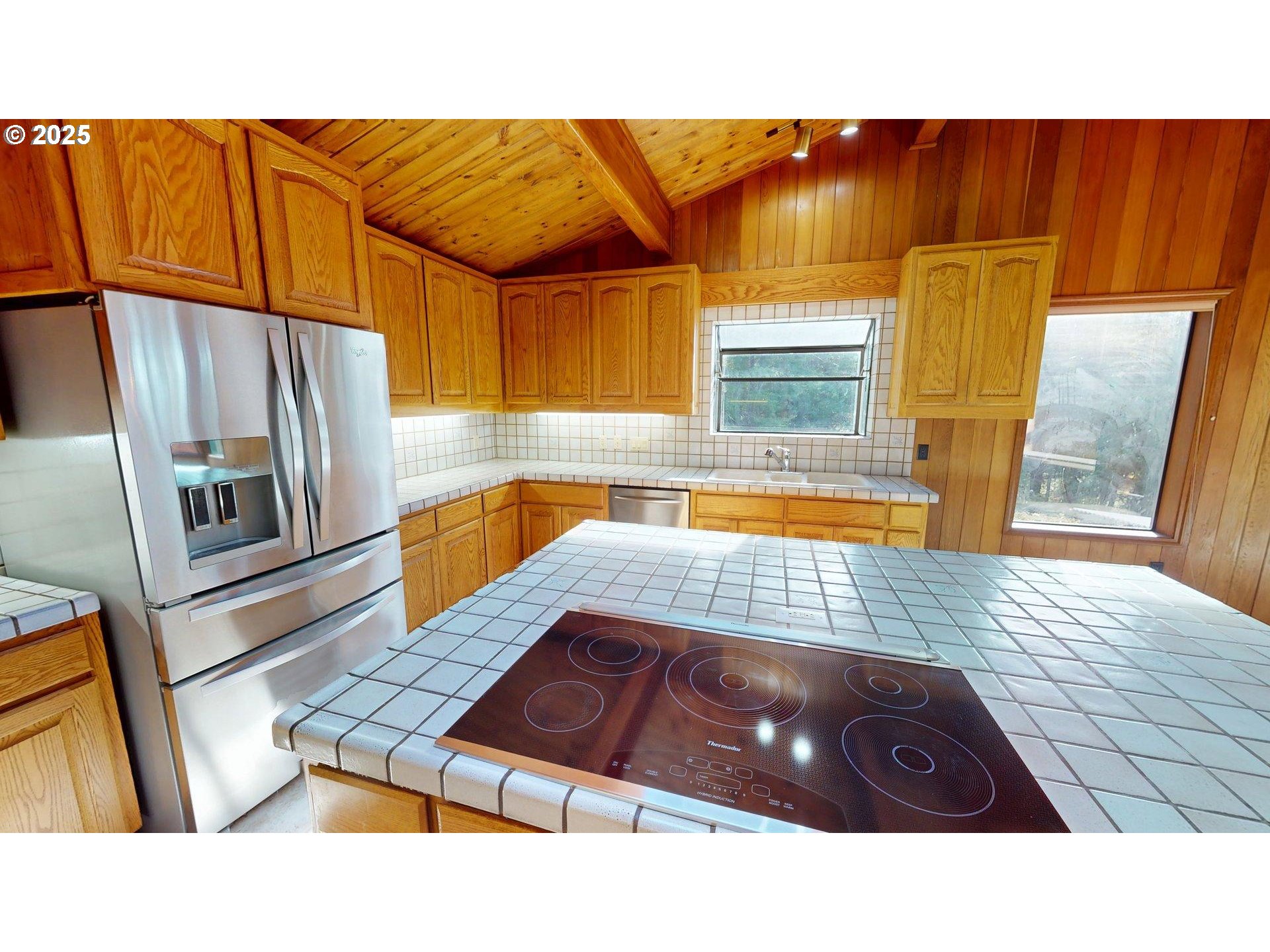 95107 Welsh Drive Gold Beach, OR 97444 - Photo 12 of 48 a bathroom with a sink and a mirror