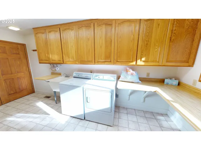 a bathroom with sink and mirror