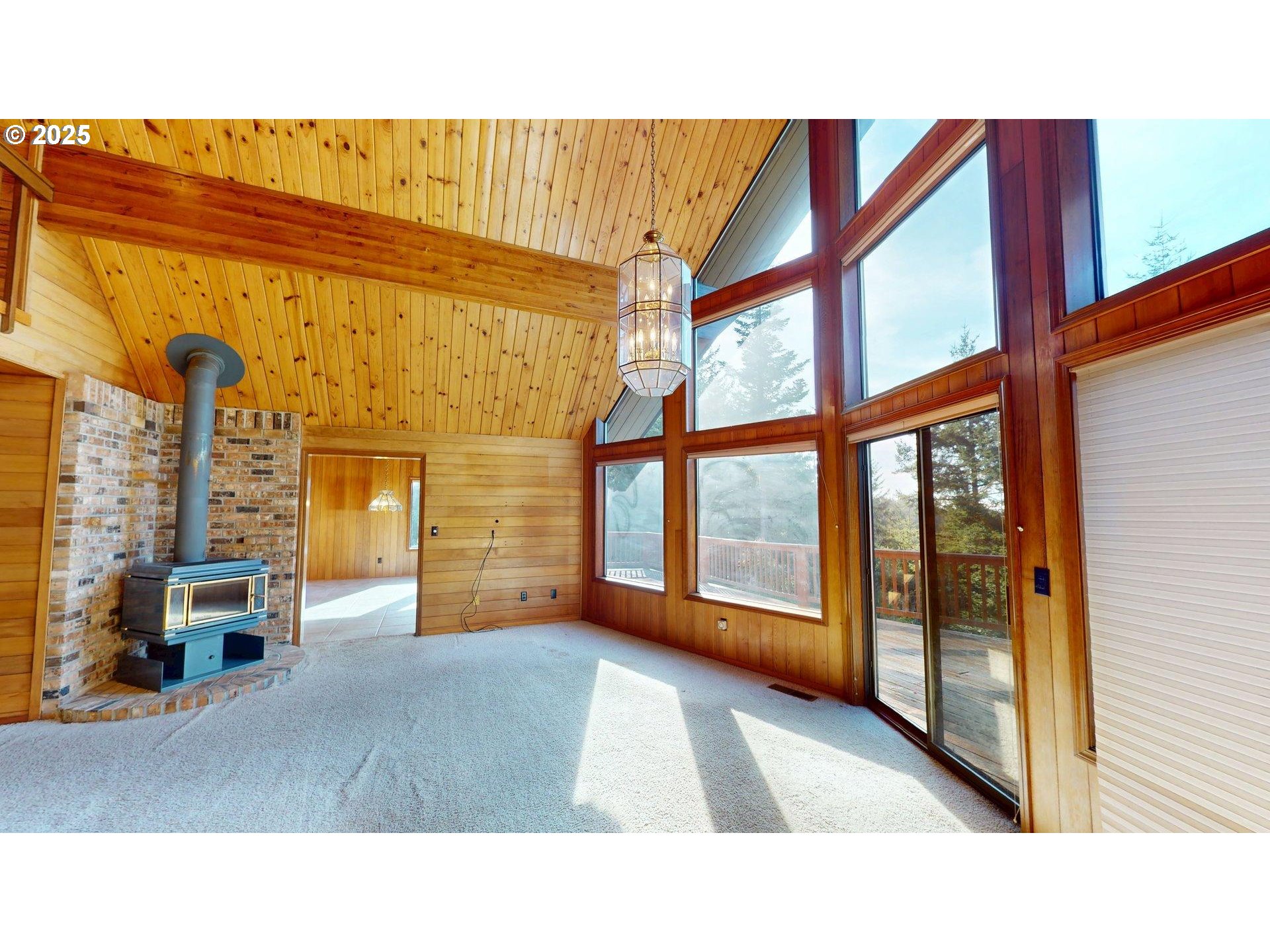 95107 Welsh Drive Gold Beach, OR 97444 - Photo 3 of 48 a open living room with a large window